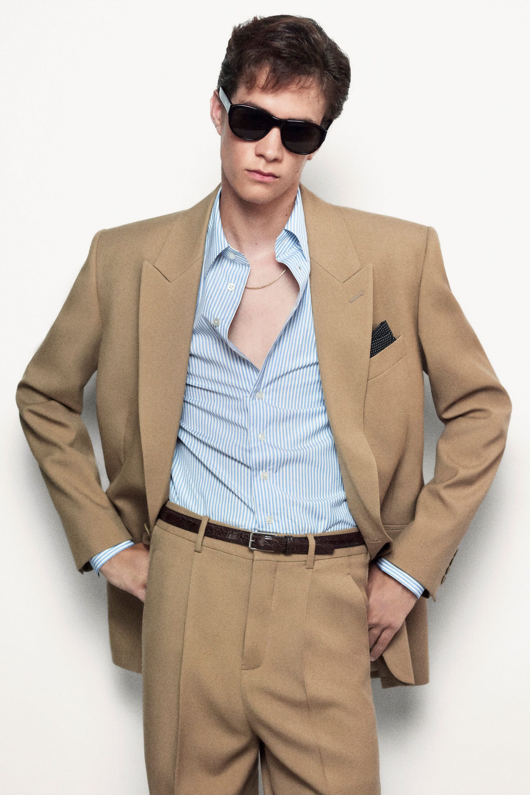 beige tailored blazer with striped shirt