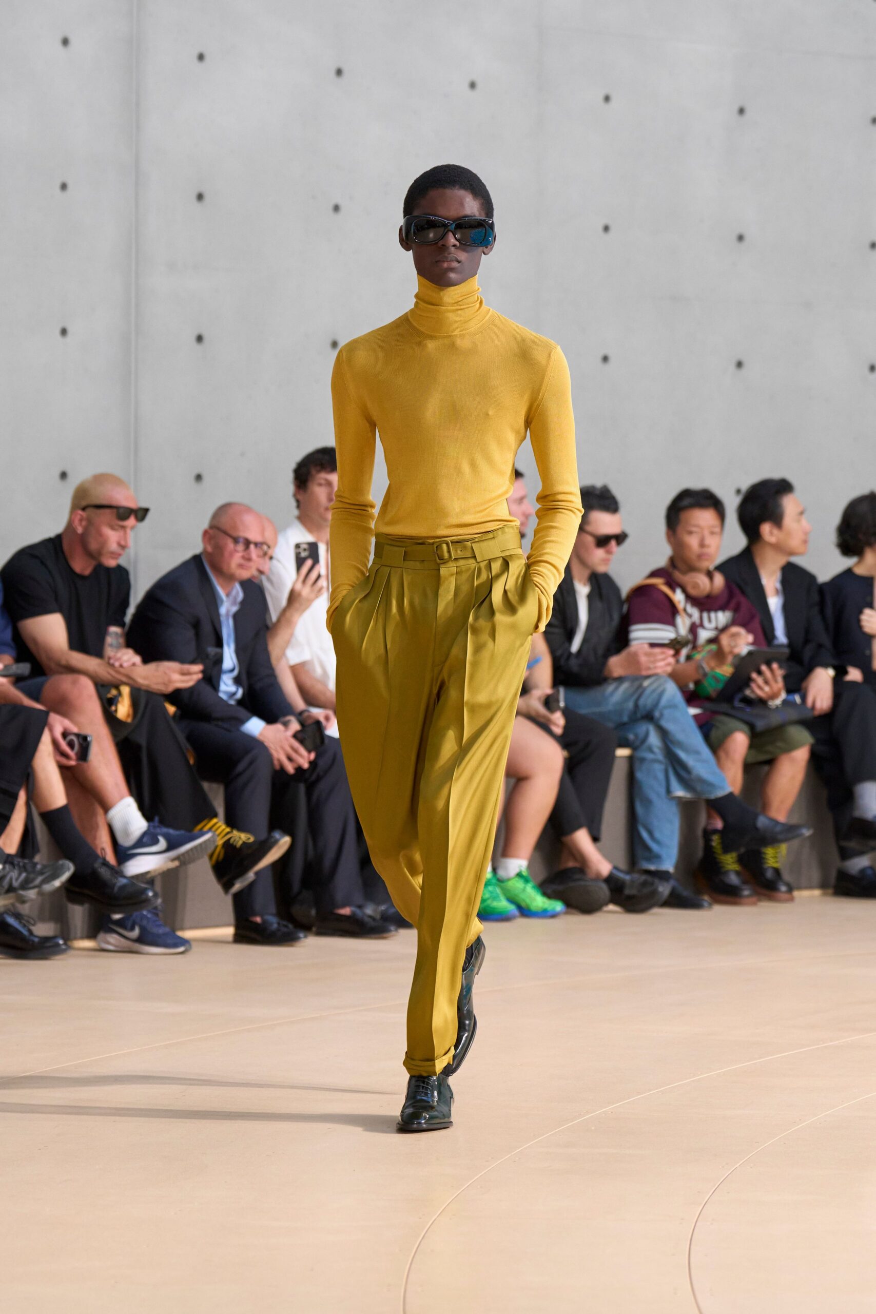 yellow fitted turtleneck top with green relaxed pants