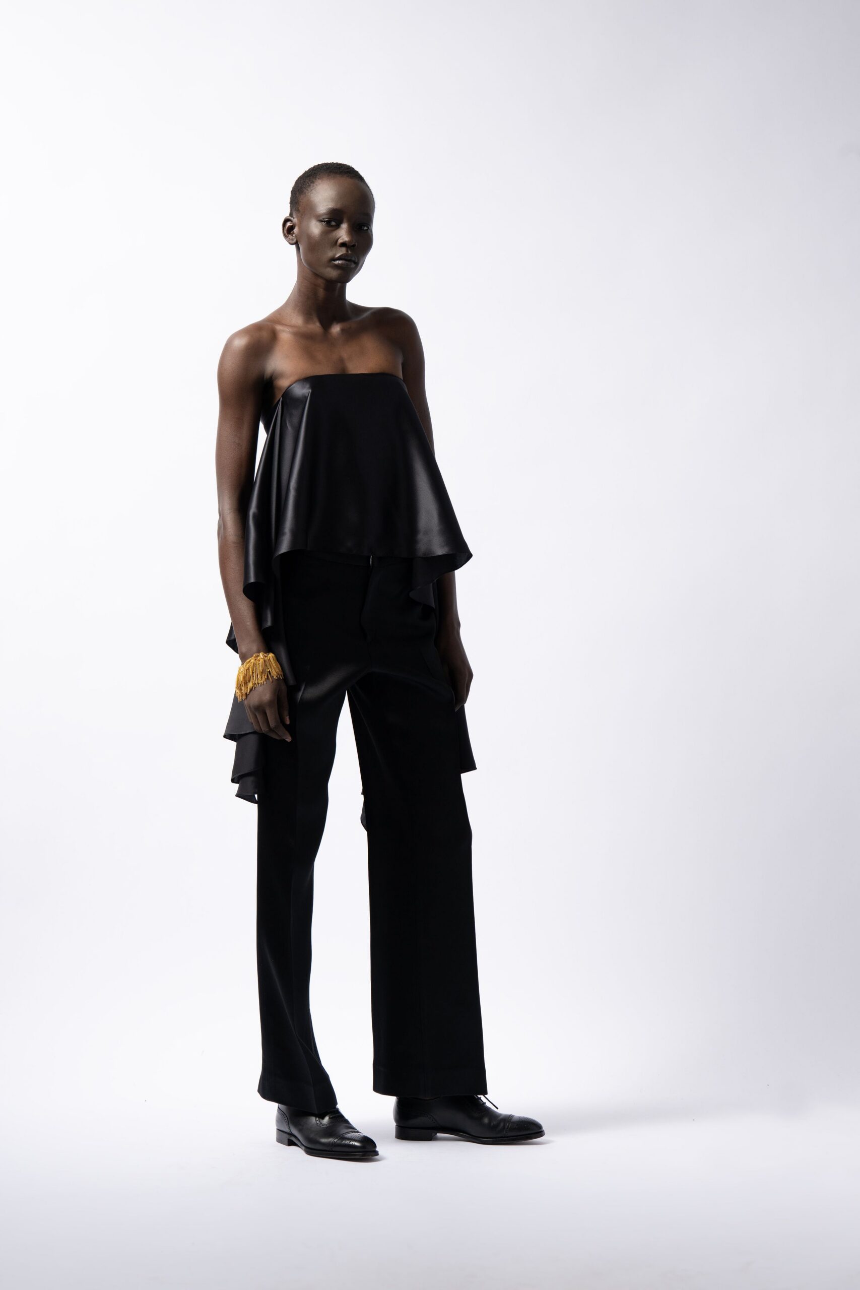black leather sleeveless off-shoulder fitted draped top