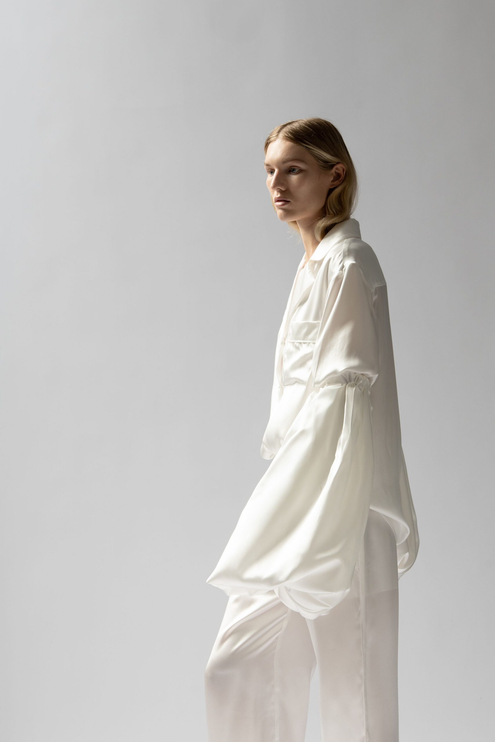 white silk long-sleeve collared relaxed pleated shiny shirt