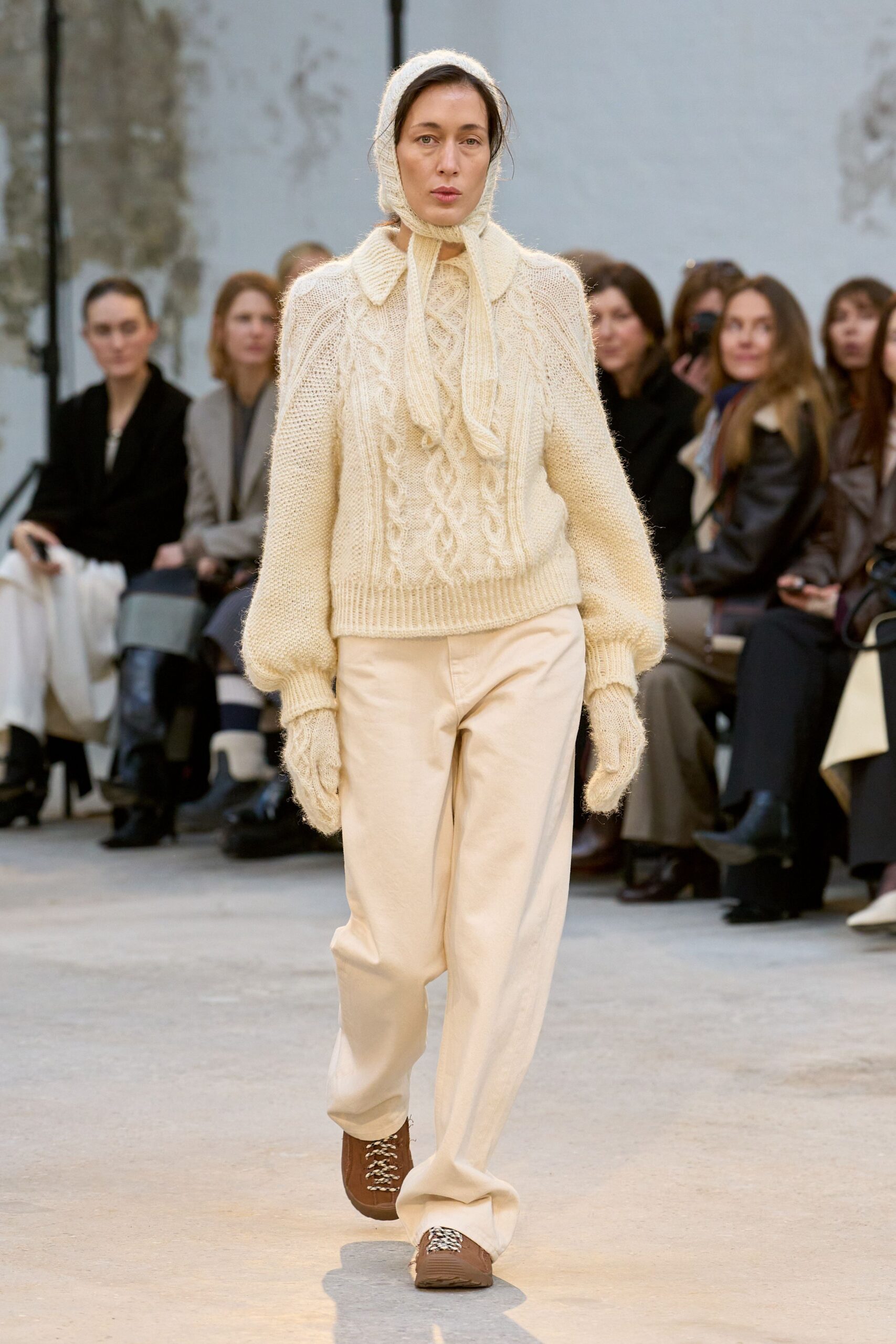white wool sweater and beige pants
