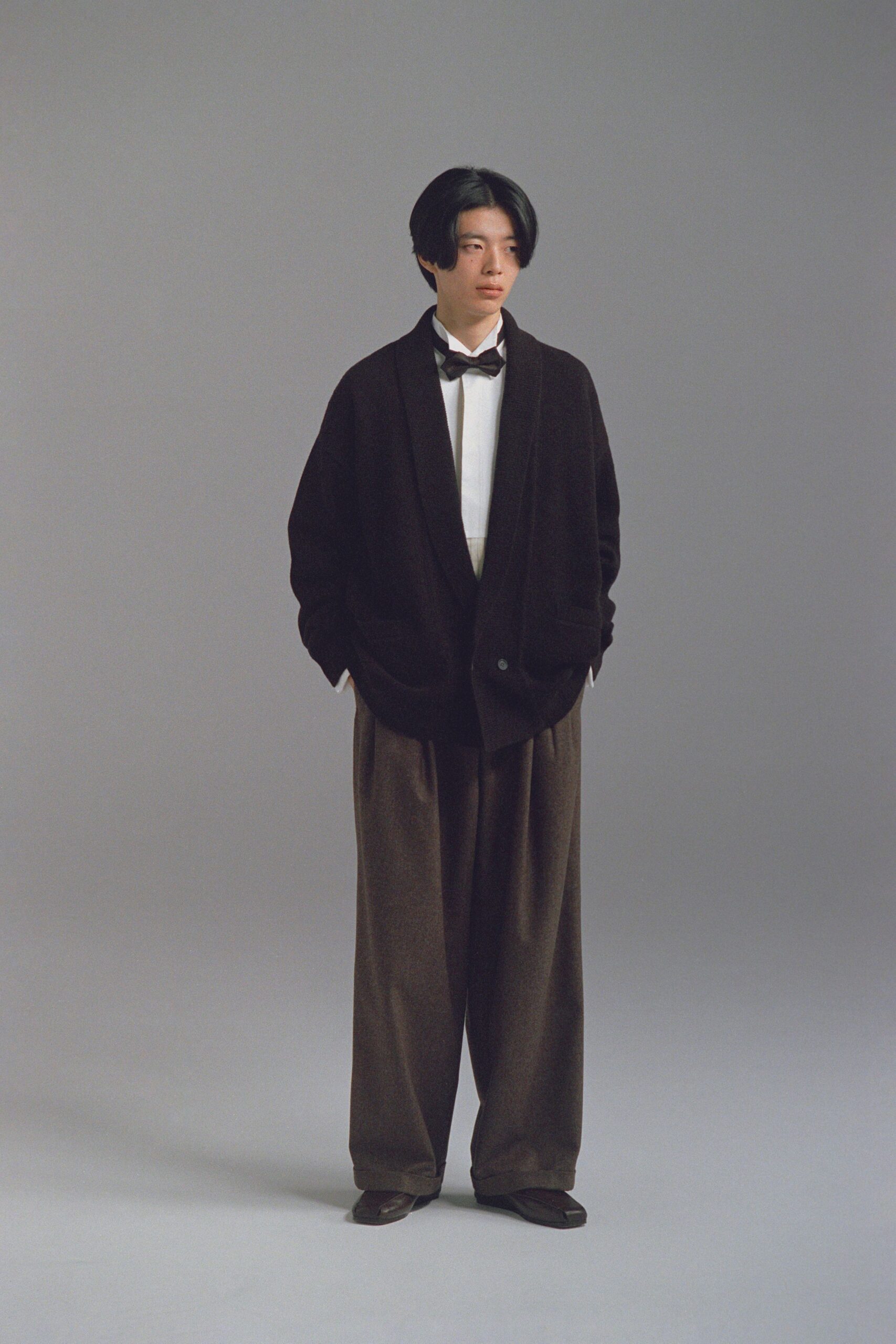 black blazer white shirt brown pants
