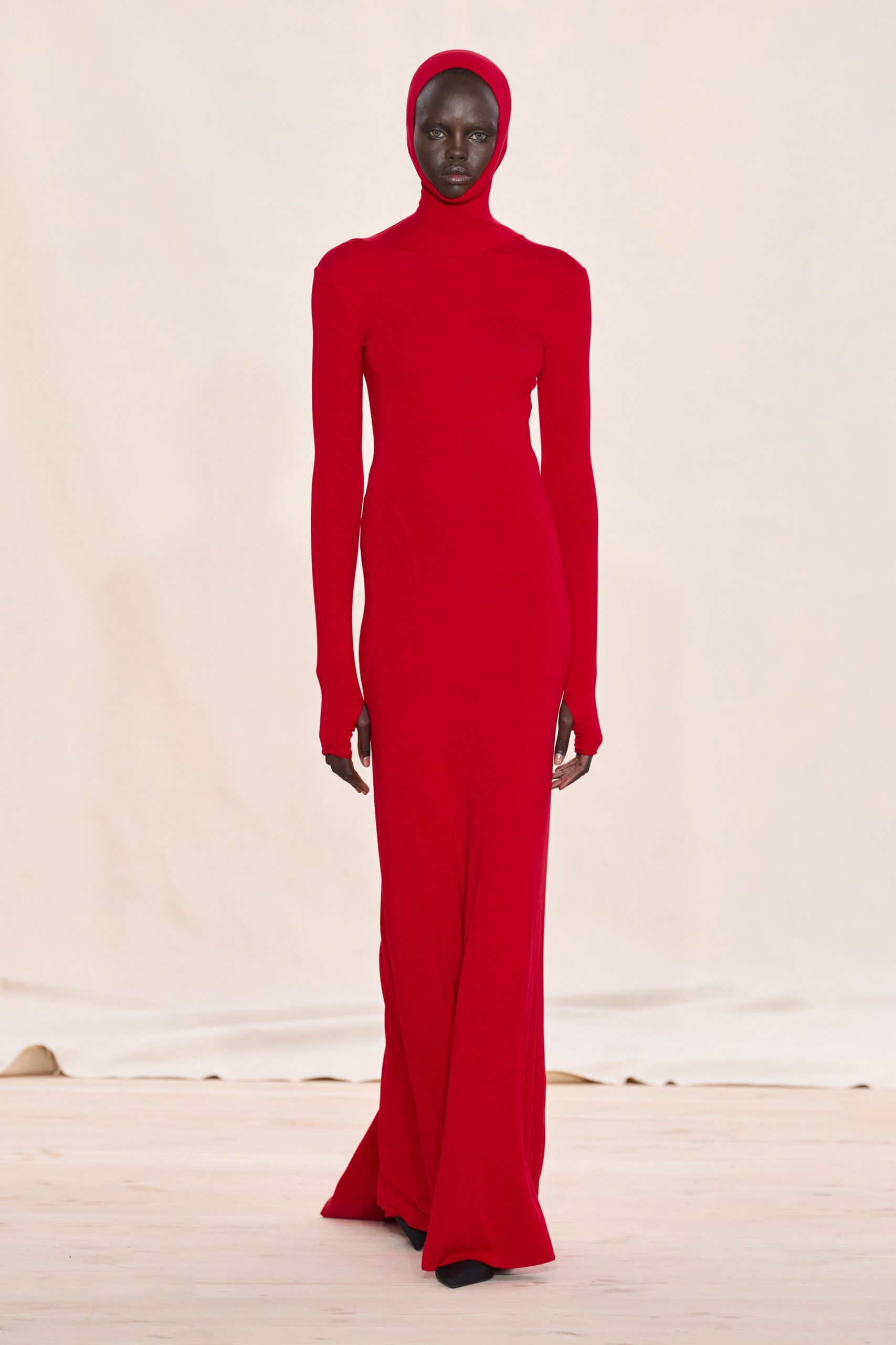 fitted red long-sleeve gown