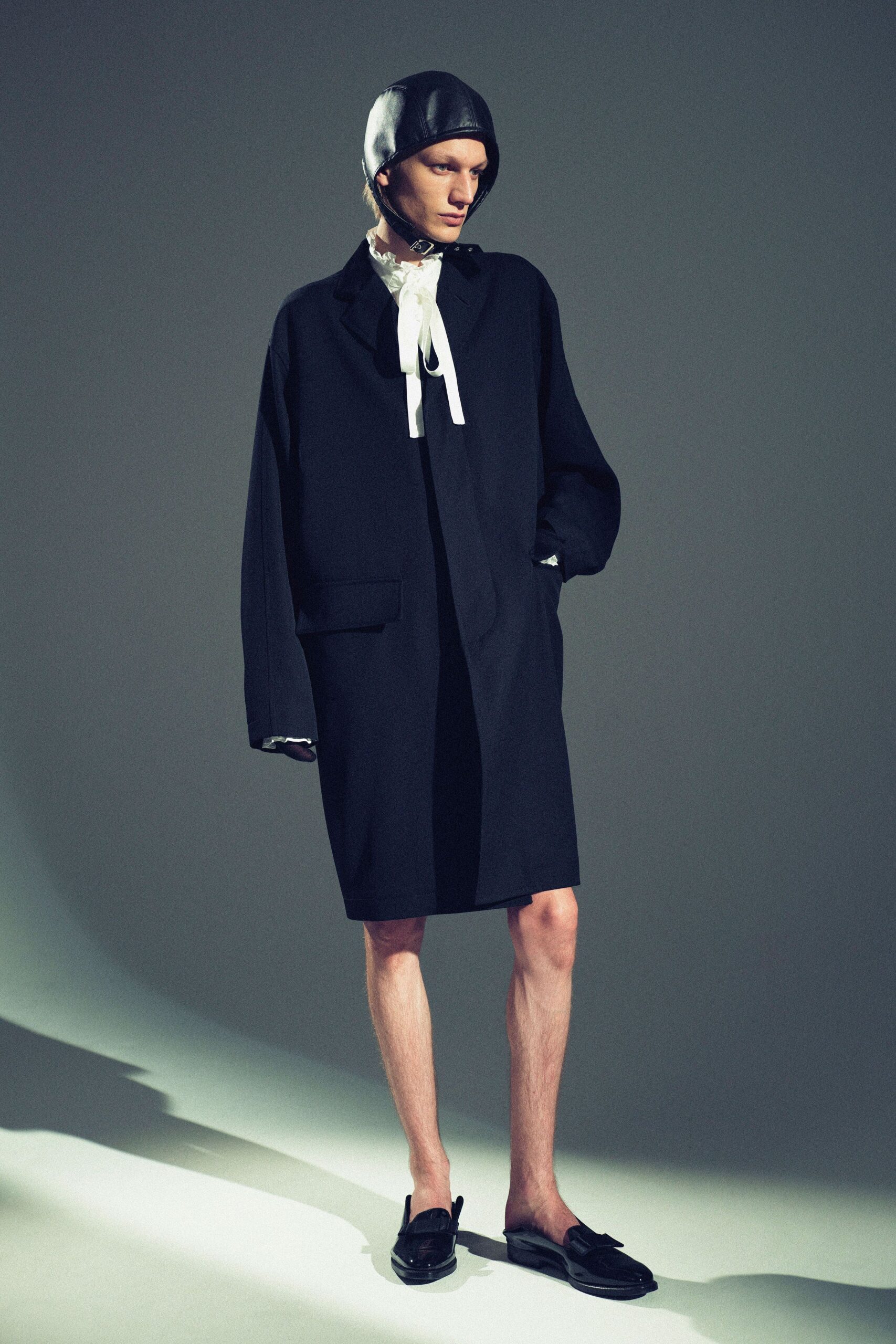 black coat with white shirt