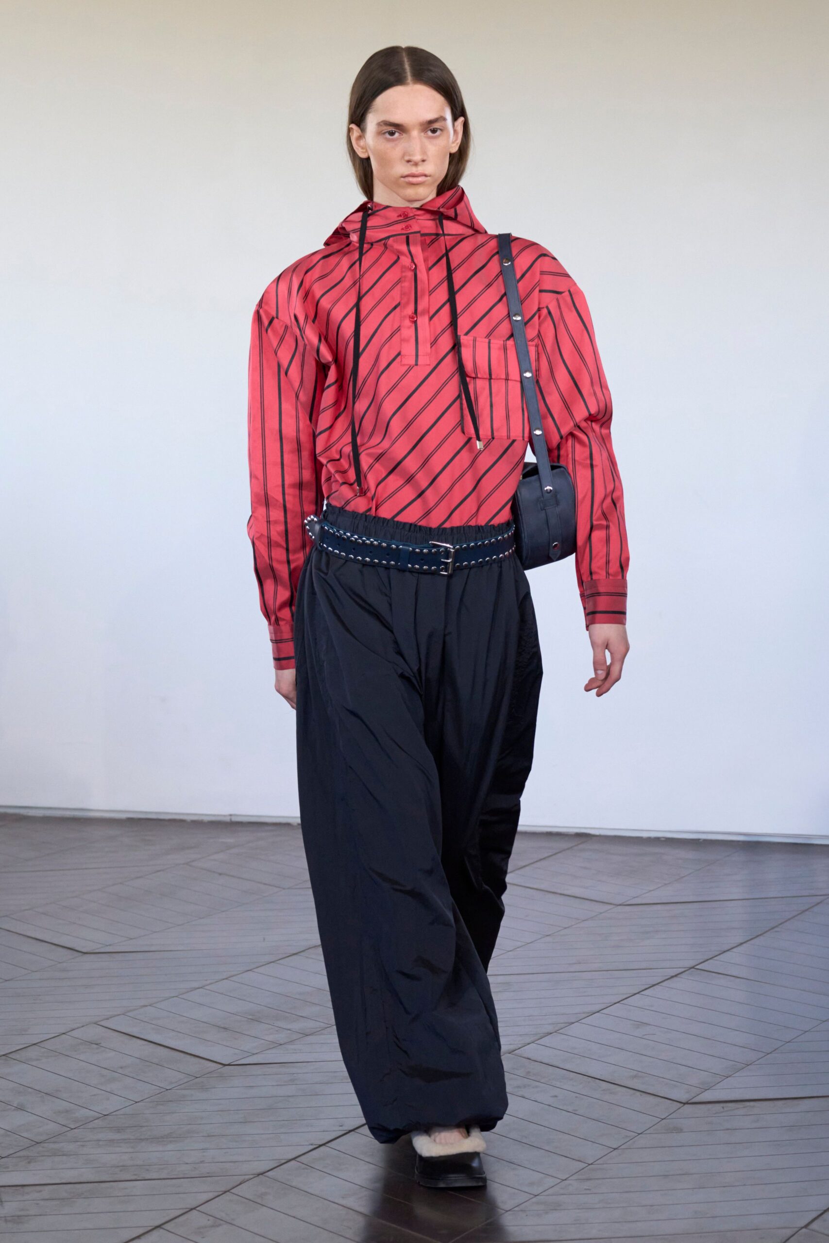 red striped shirt with black pants