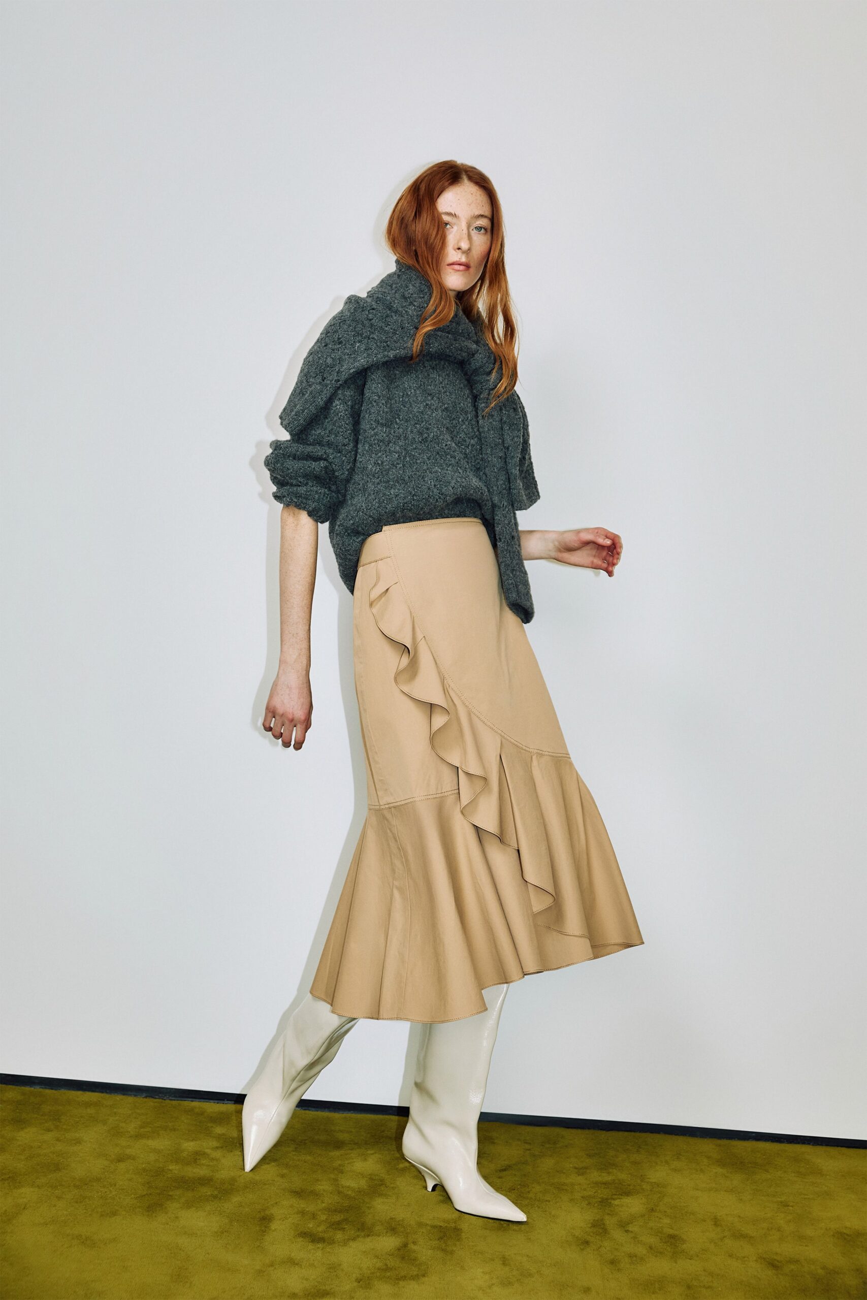 beige leather fitted flared midi skirt