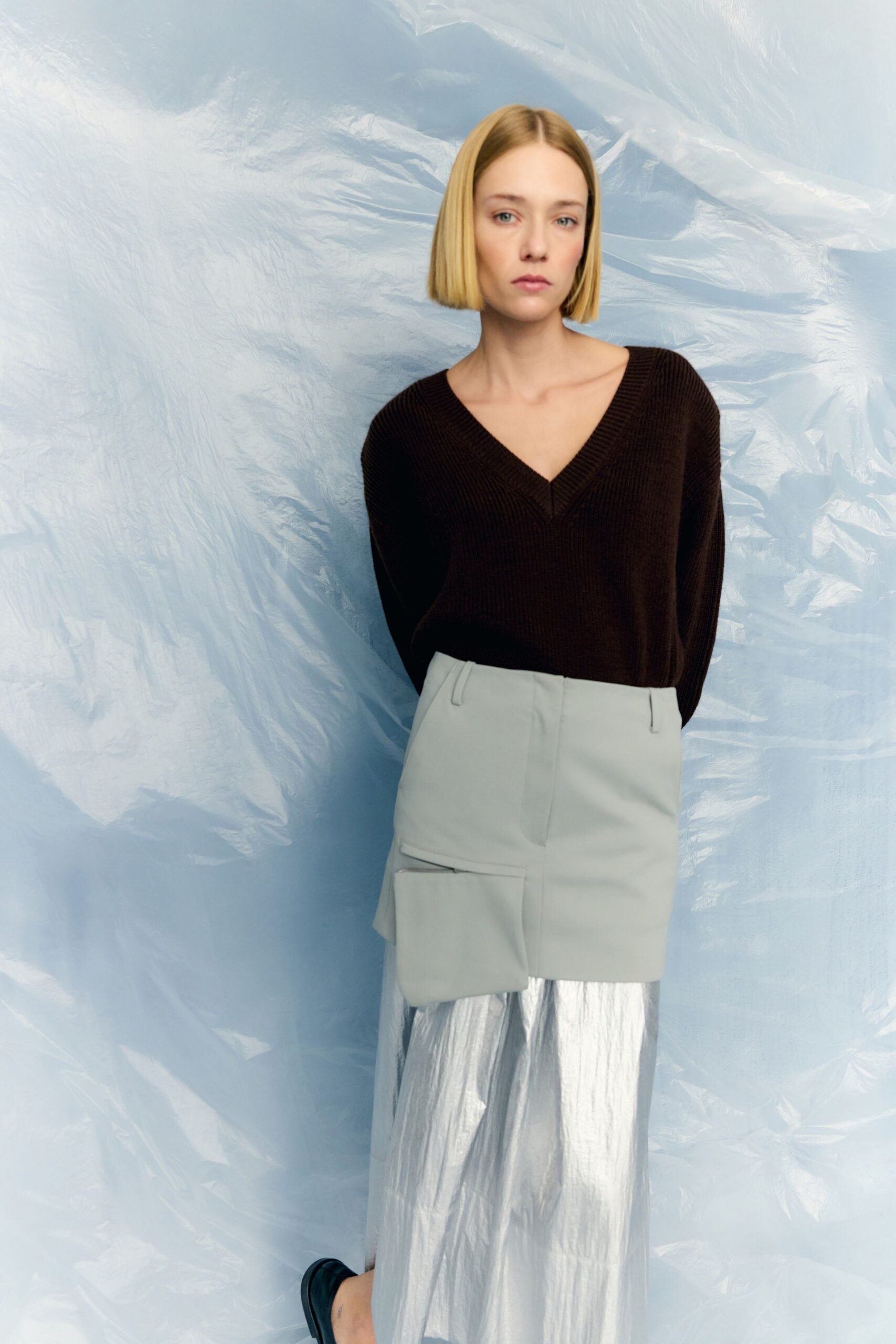 brown sweater gray skirt silver pants