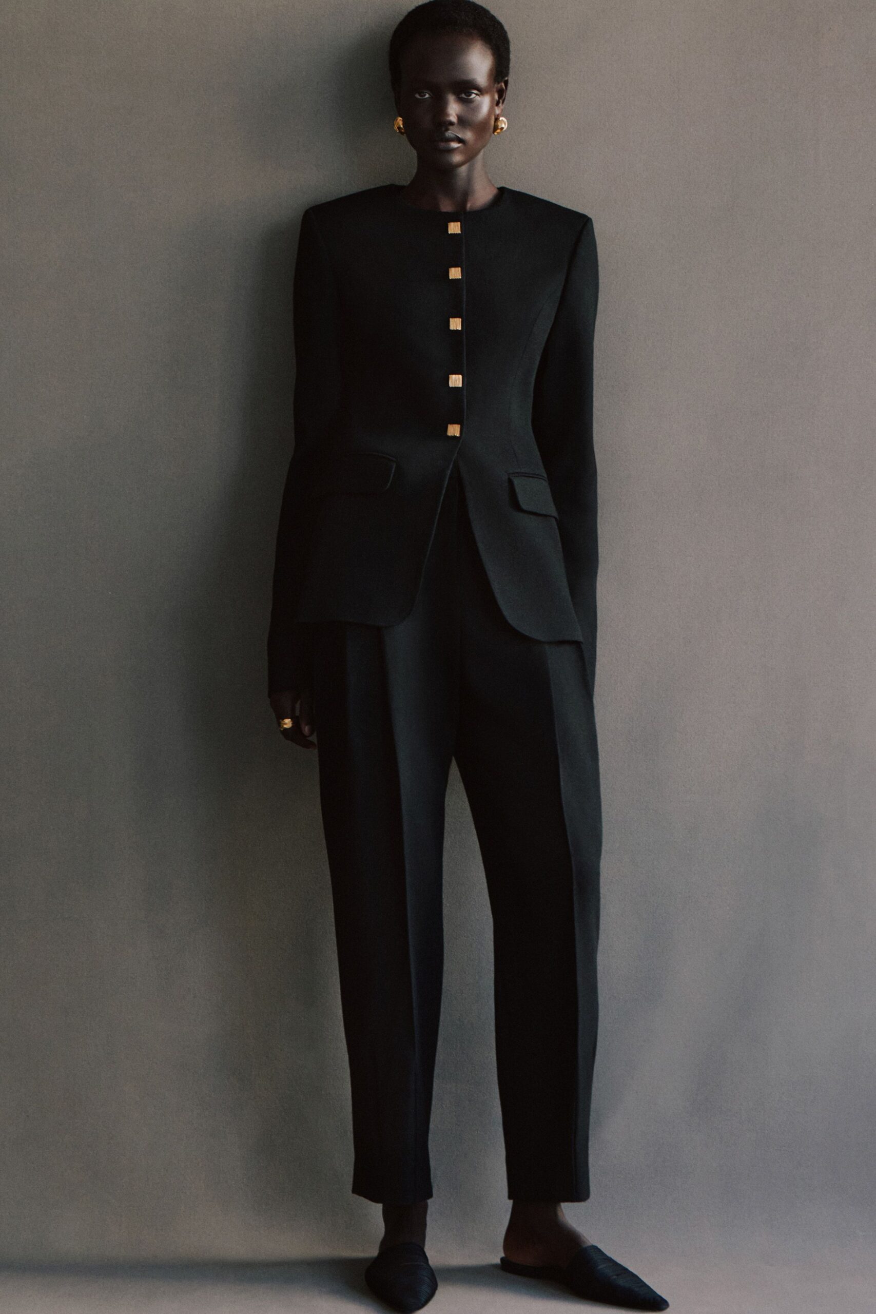 black tailored suit with shoes
