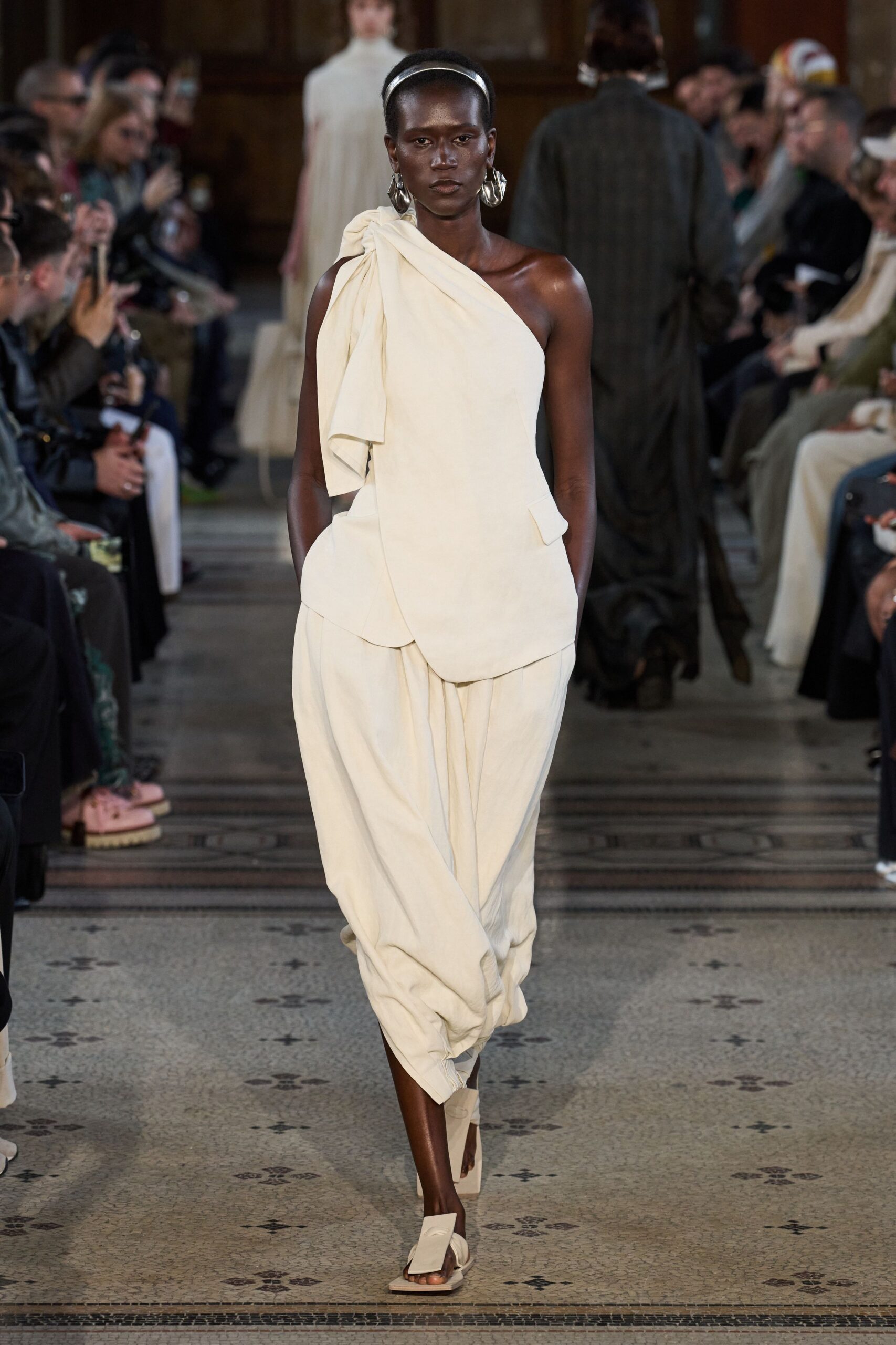 white cotton sleeveless asymmetric relaxed pleated pockets jumpsuit