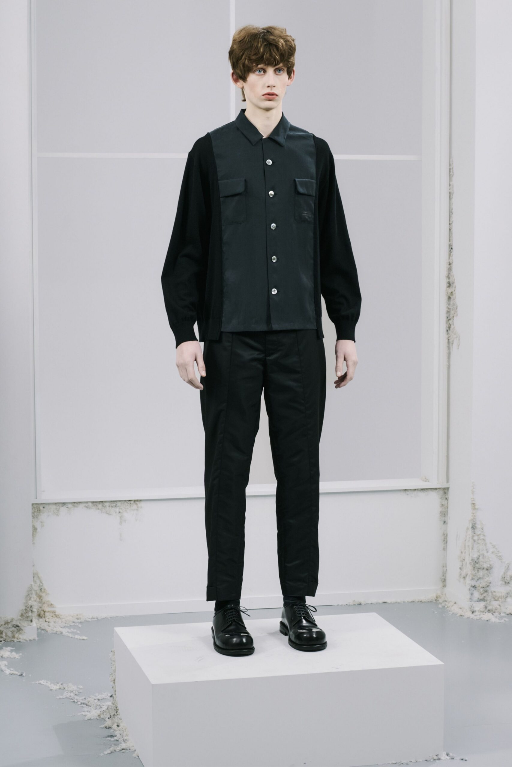 black fitted shirt and pants