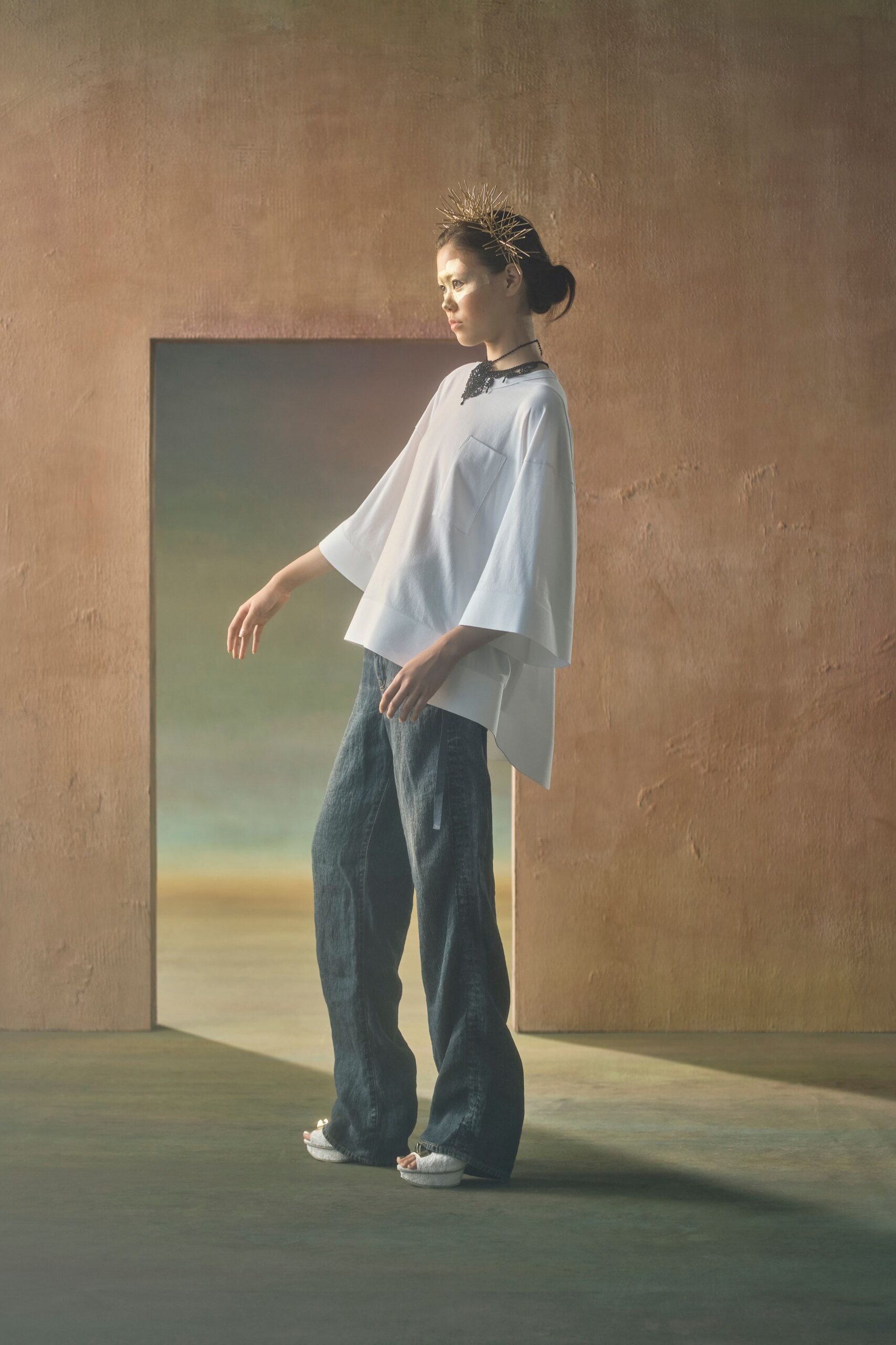 white relaxed top with blue wide-leg pants