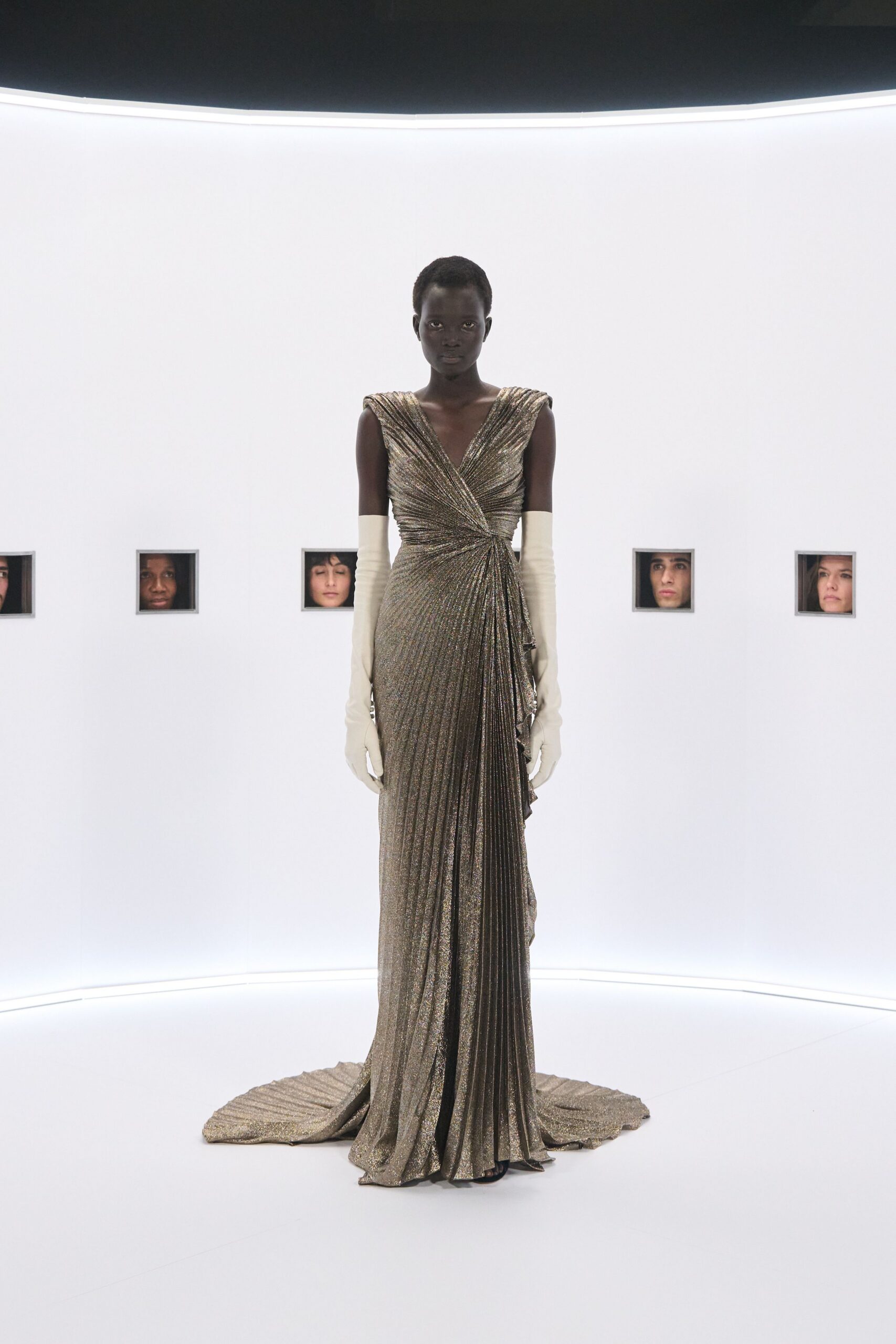 gold silk long-sleeve v-neck fitted pleated draped gown