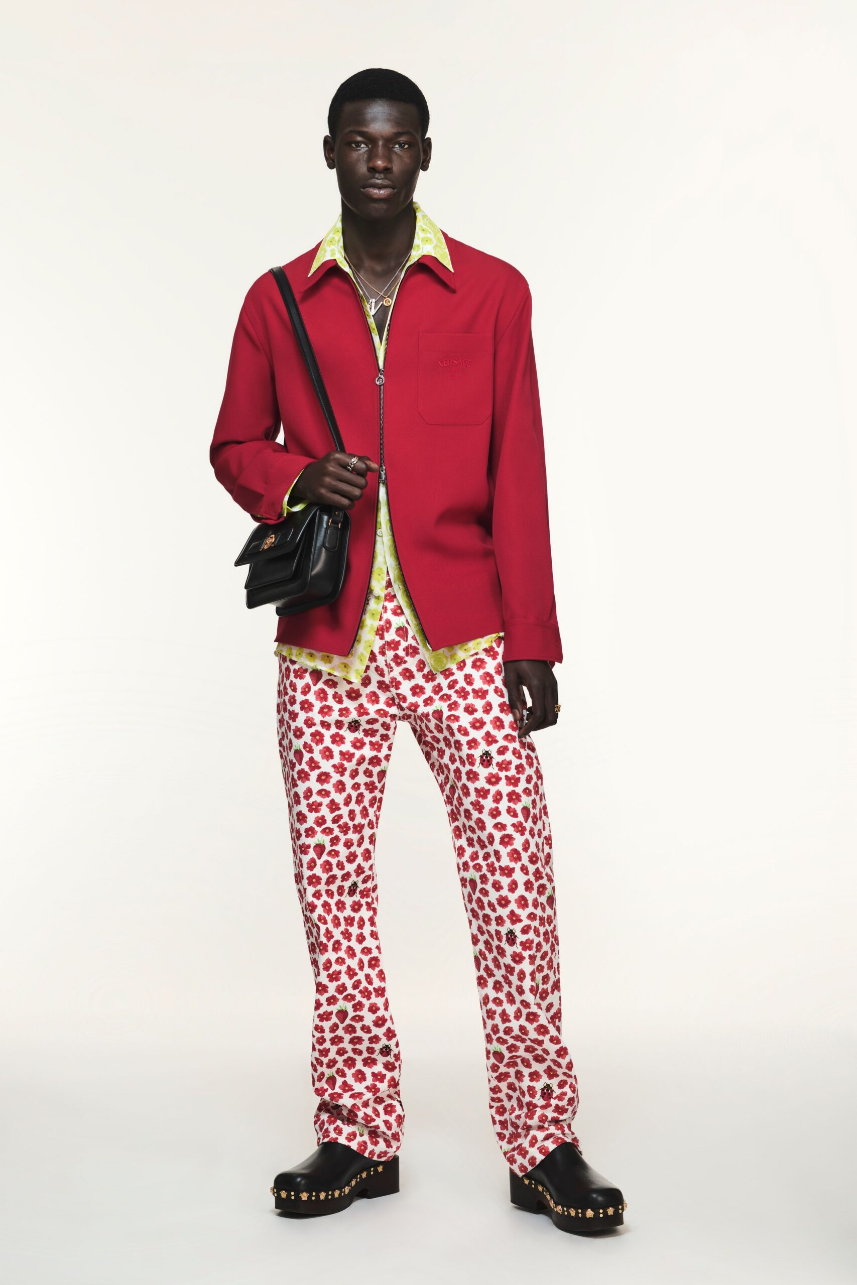 red fitted jacket with printed pants