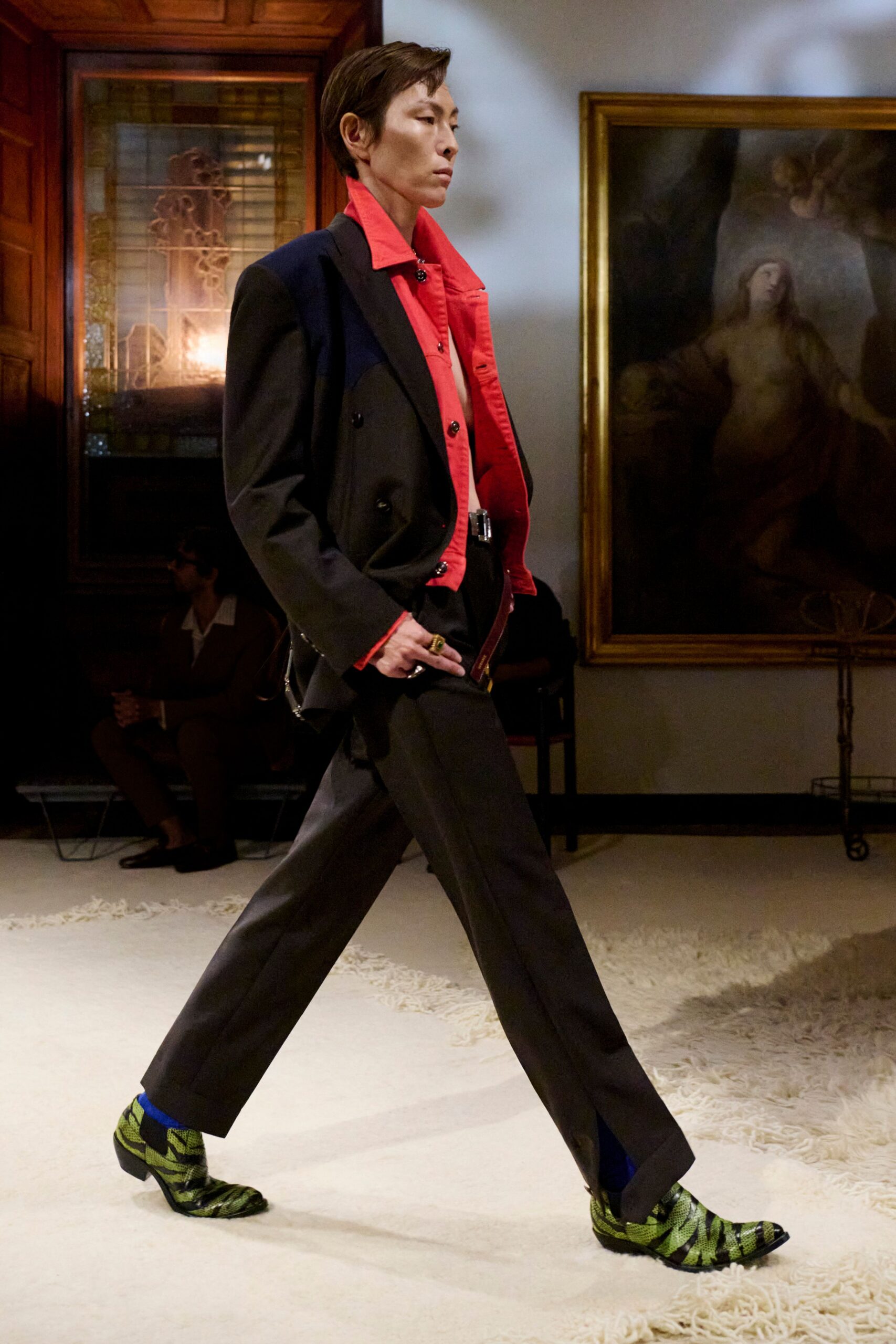 black blazer red shirt tailored pants green shoes