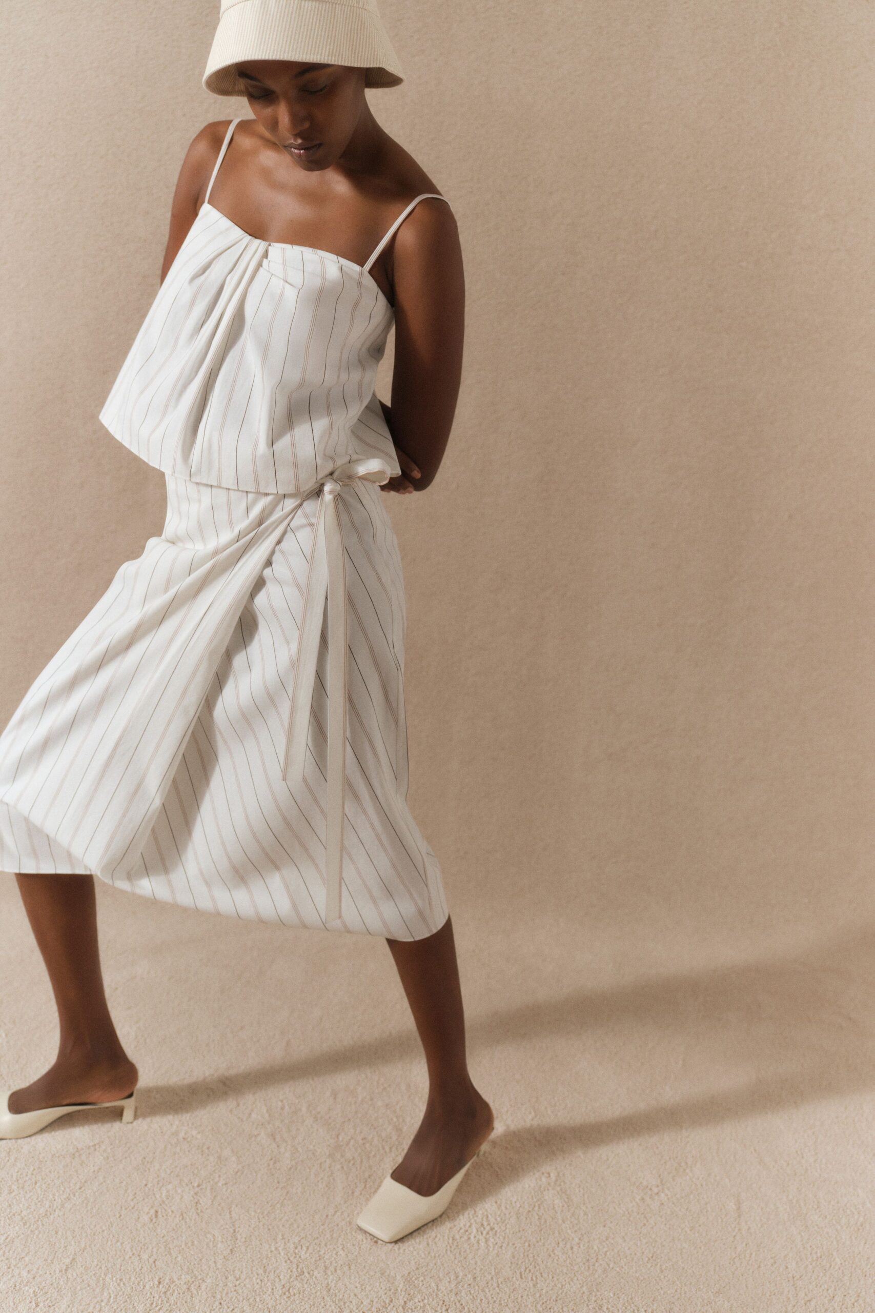 white cotton asymmetric fitted high-waisted striped midi skirt