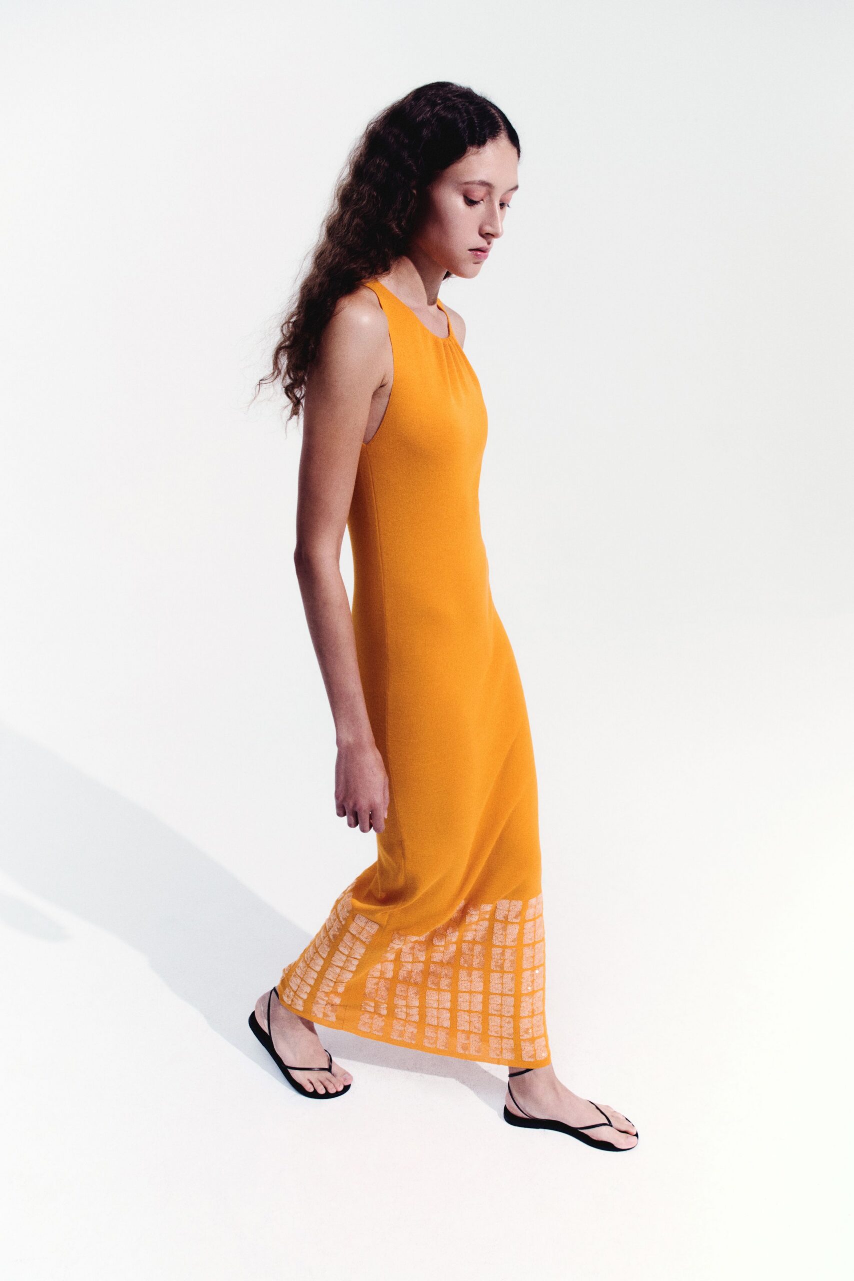 orange cotton sleeveless high-neck fitted tiered maxi dress