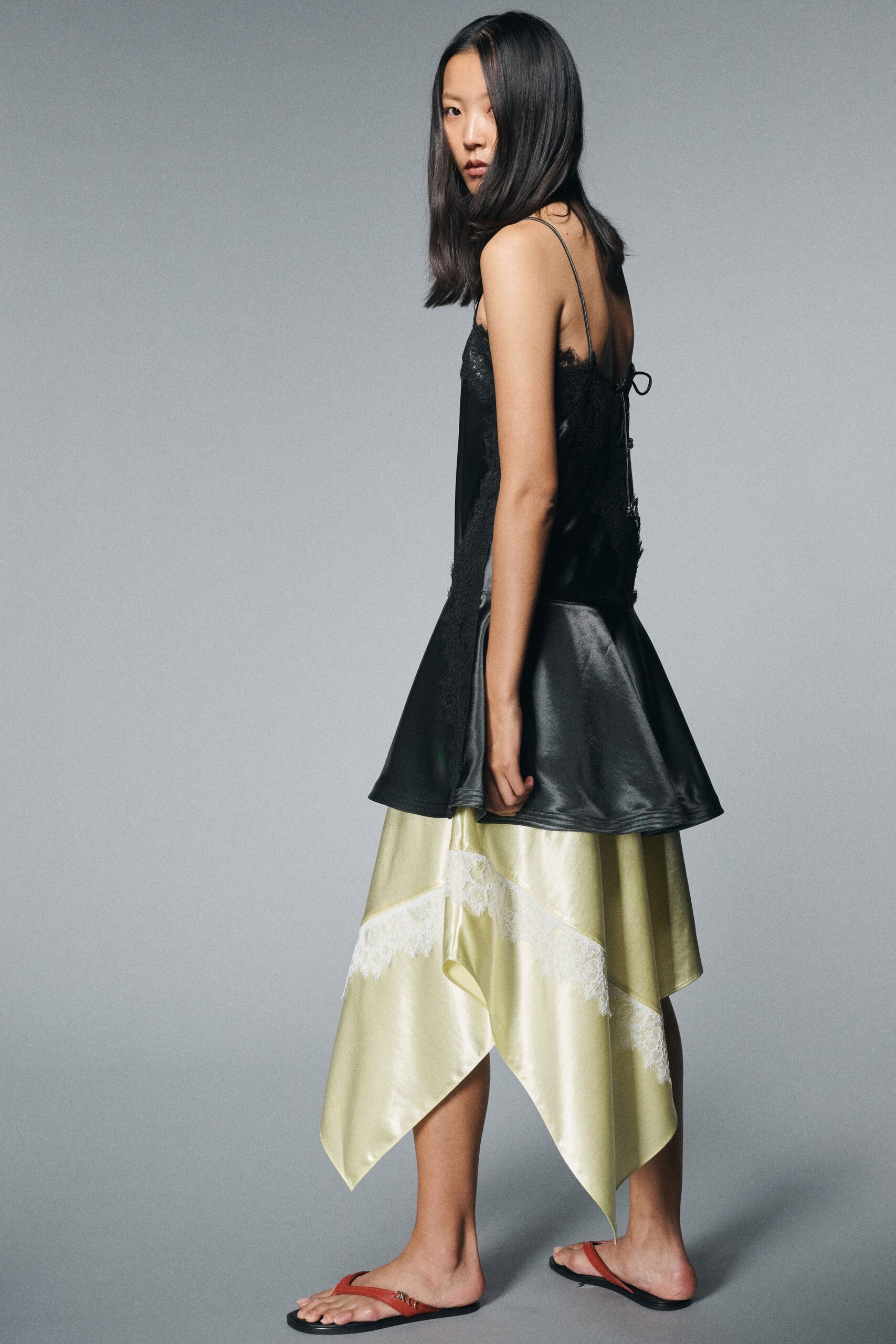 black silk asymmetric dress with sandals
