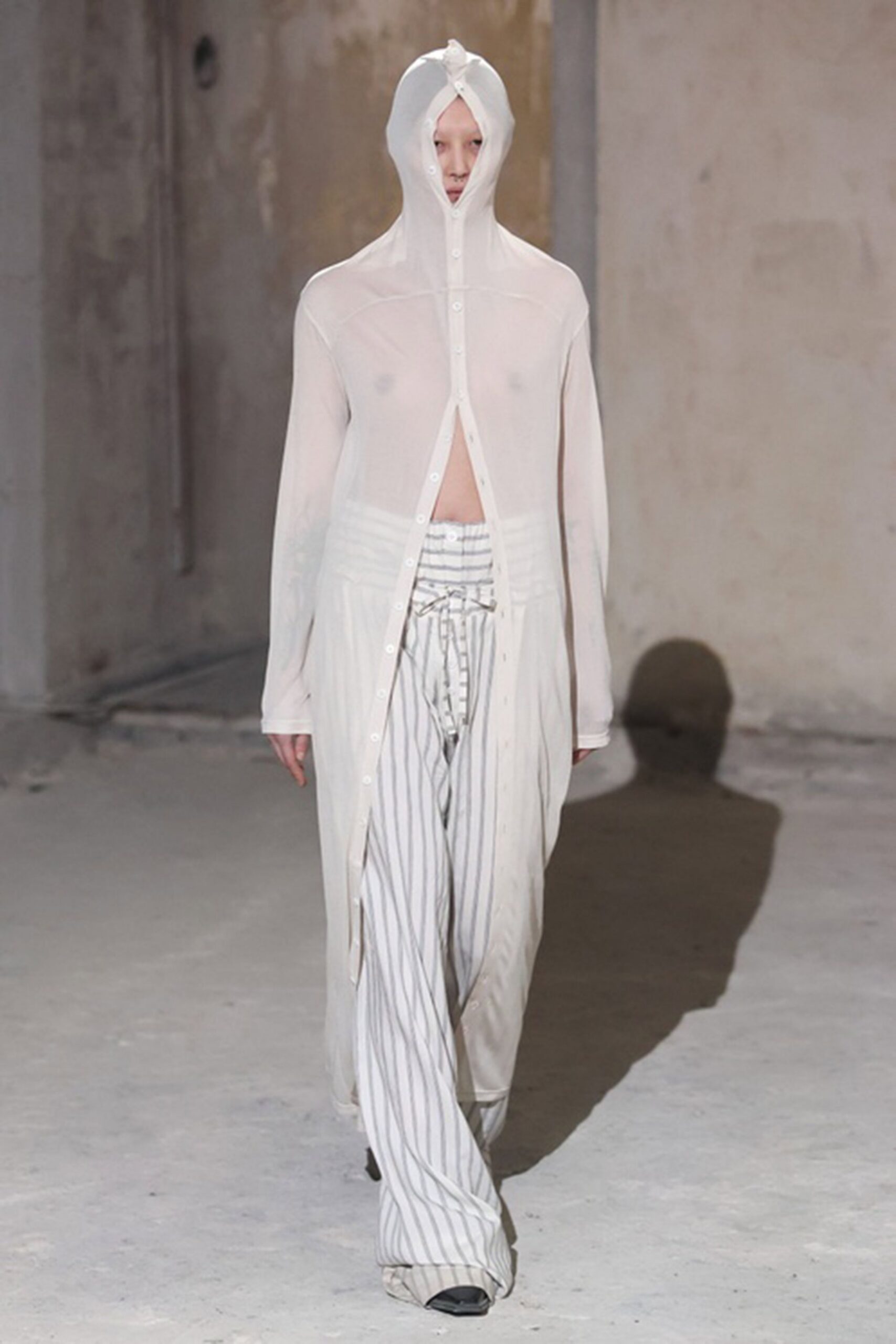 white cotton long-sleeve collared relaxed buttoned sheer coat