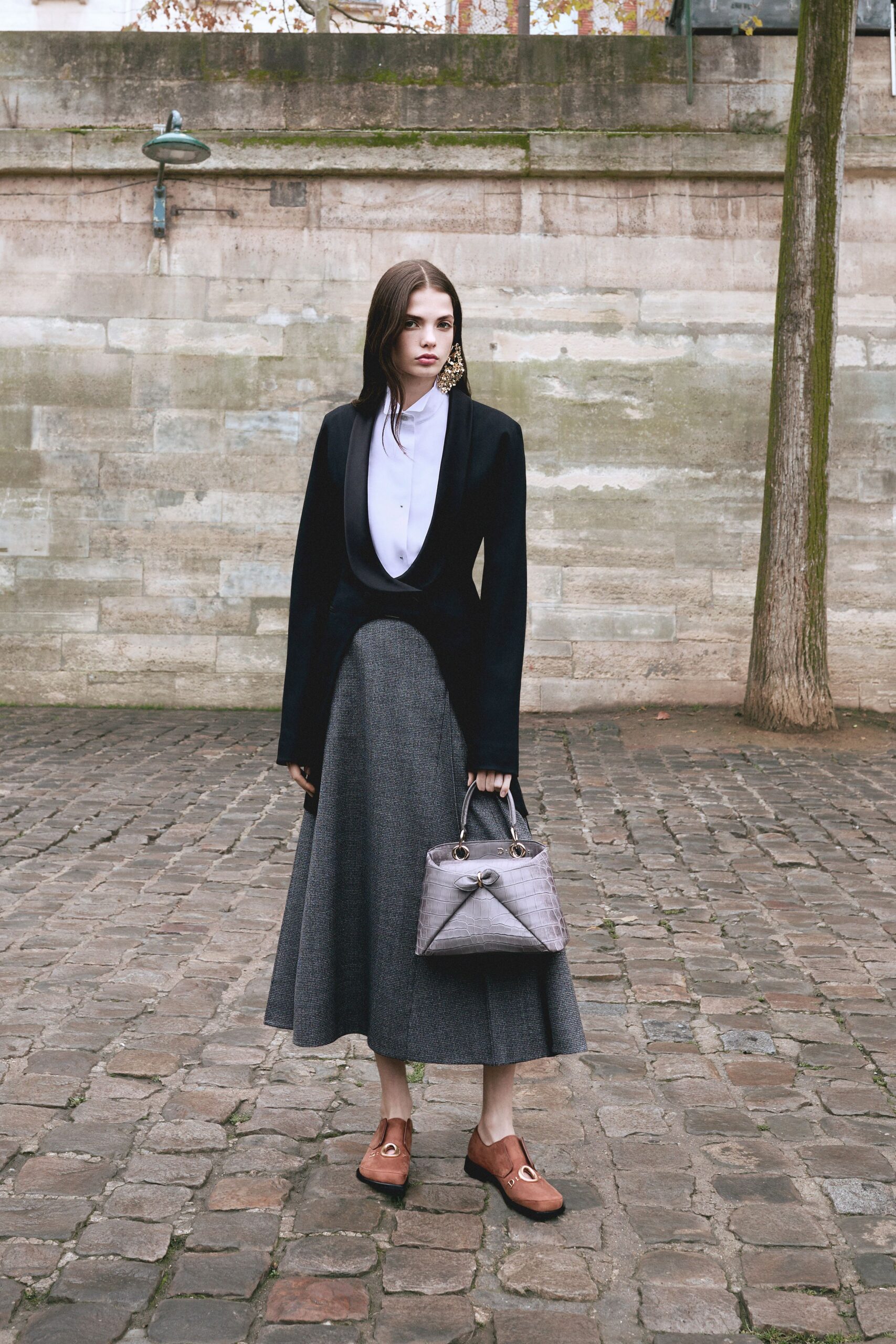 black velvet blazer with gray skirt
