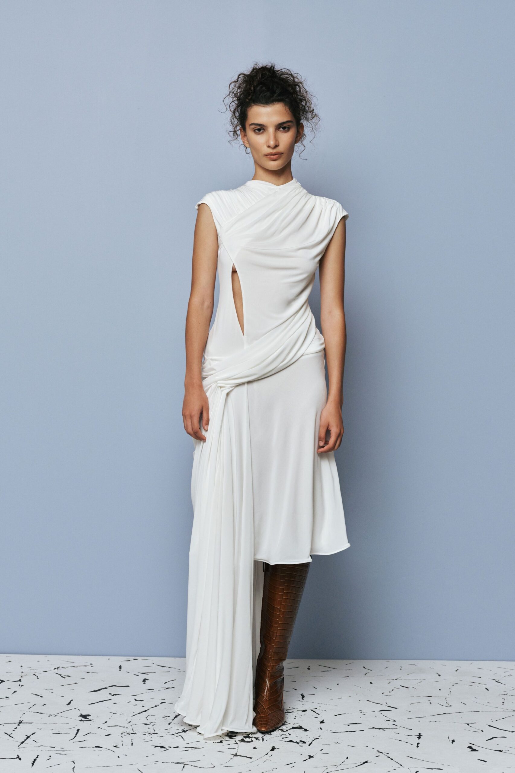 white silk sleeveless high-neck fitted draped flowing dress