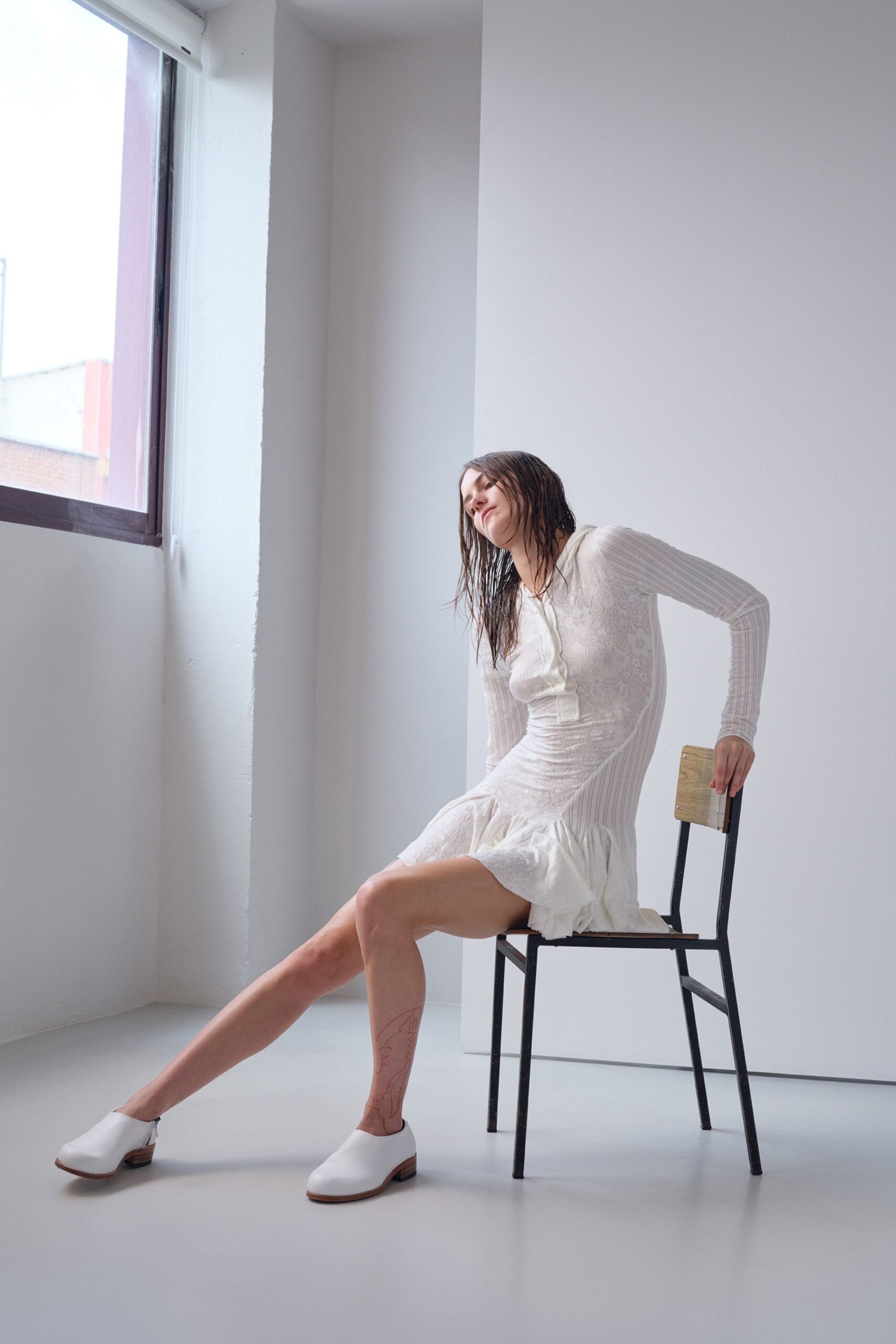 white cotton long-sleeve collared fitted ruffled sheer dress