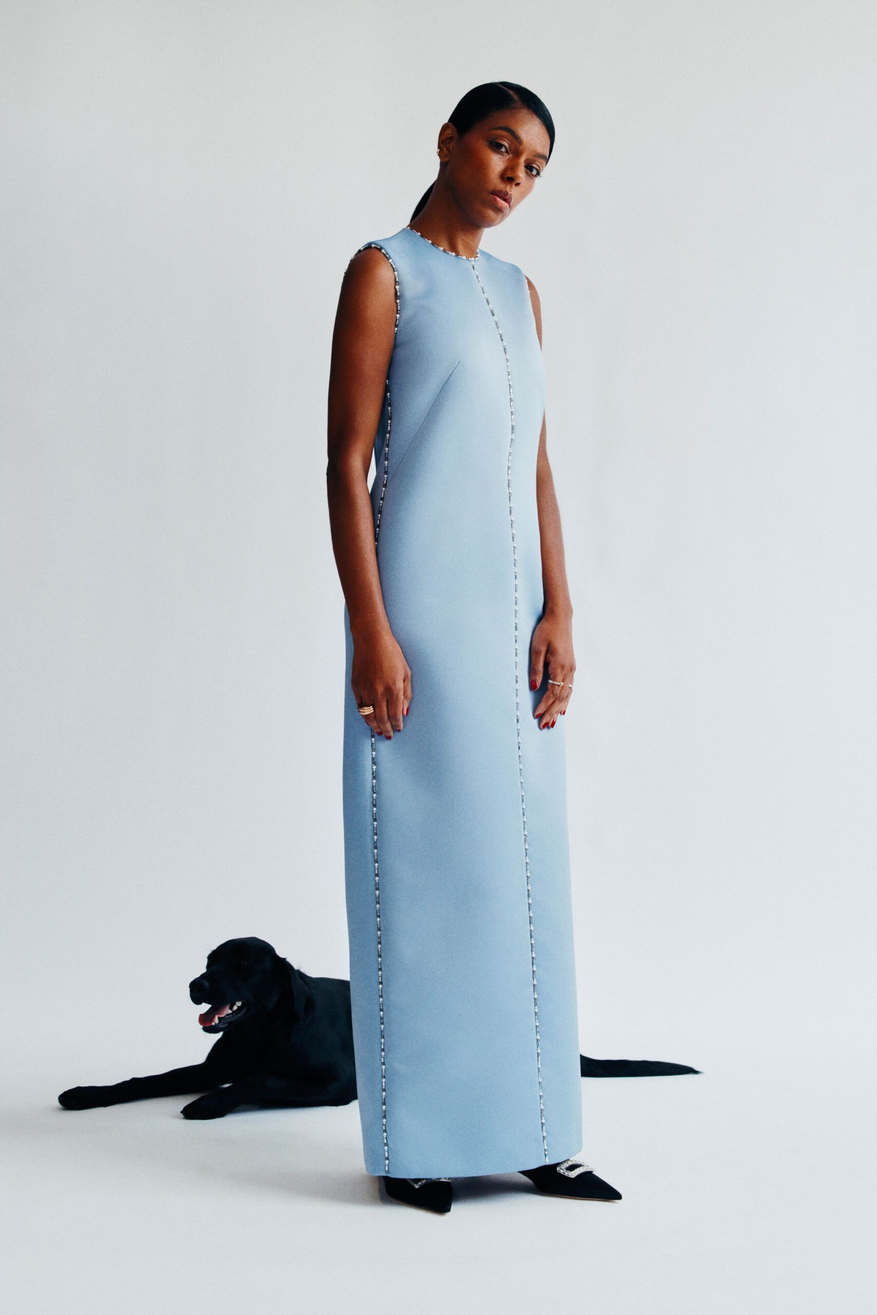 blue cotton sleeveless high-neck fitted straight-leg zippered gown