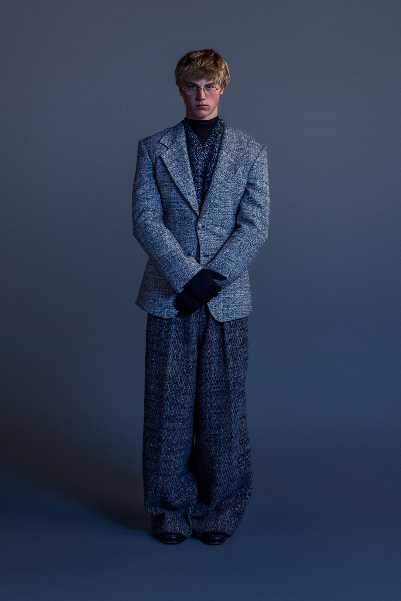 gray tweed blazer with black shirt
