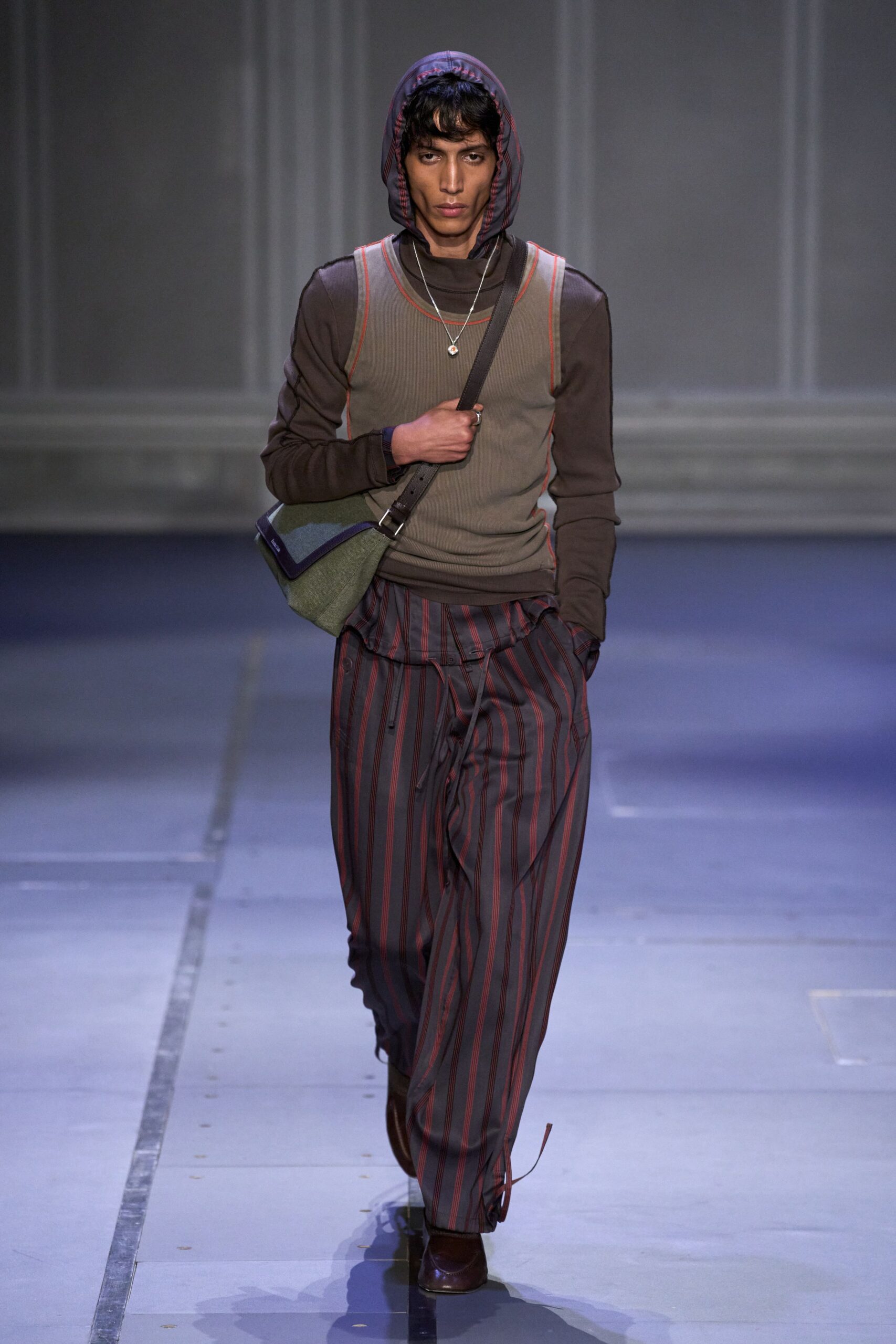 brown hoodie green tank-top gray striped pants