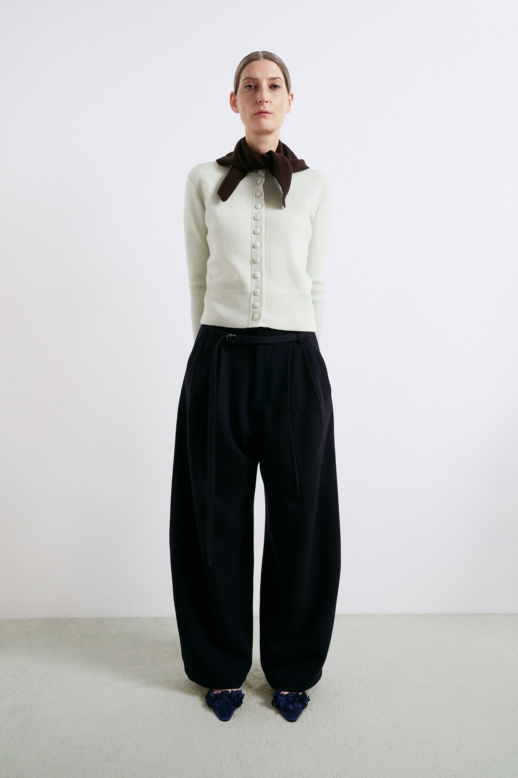 white wool long-sleeve collared fitted buttoned cardigan