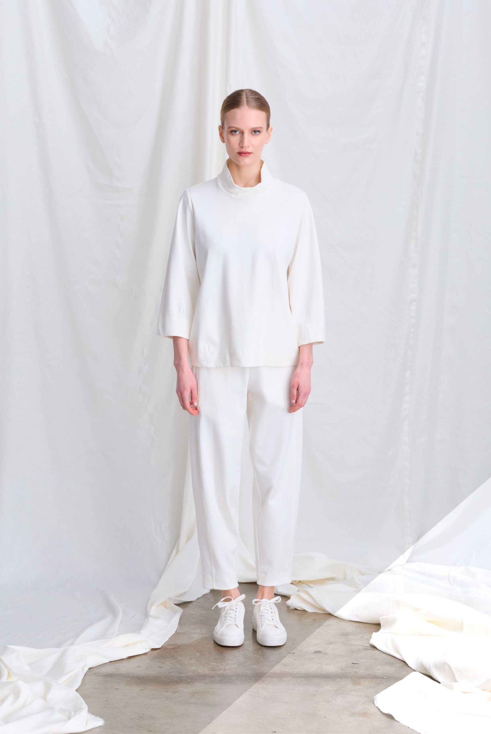 white cotton long-sleeve high-neck relaxed top