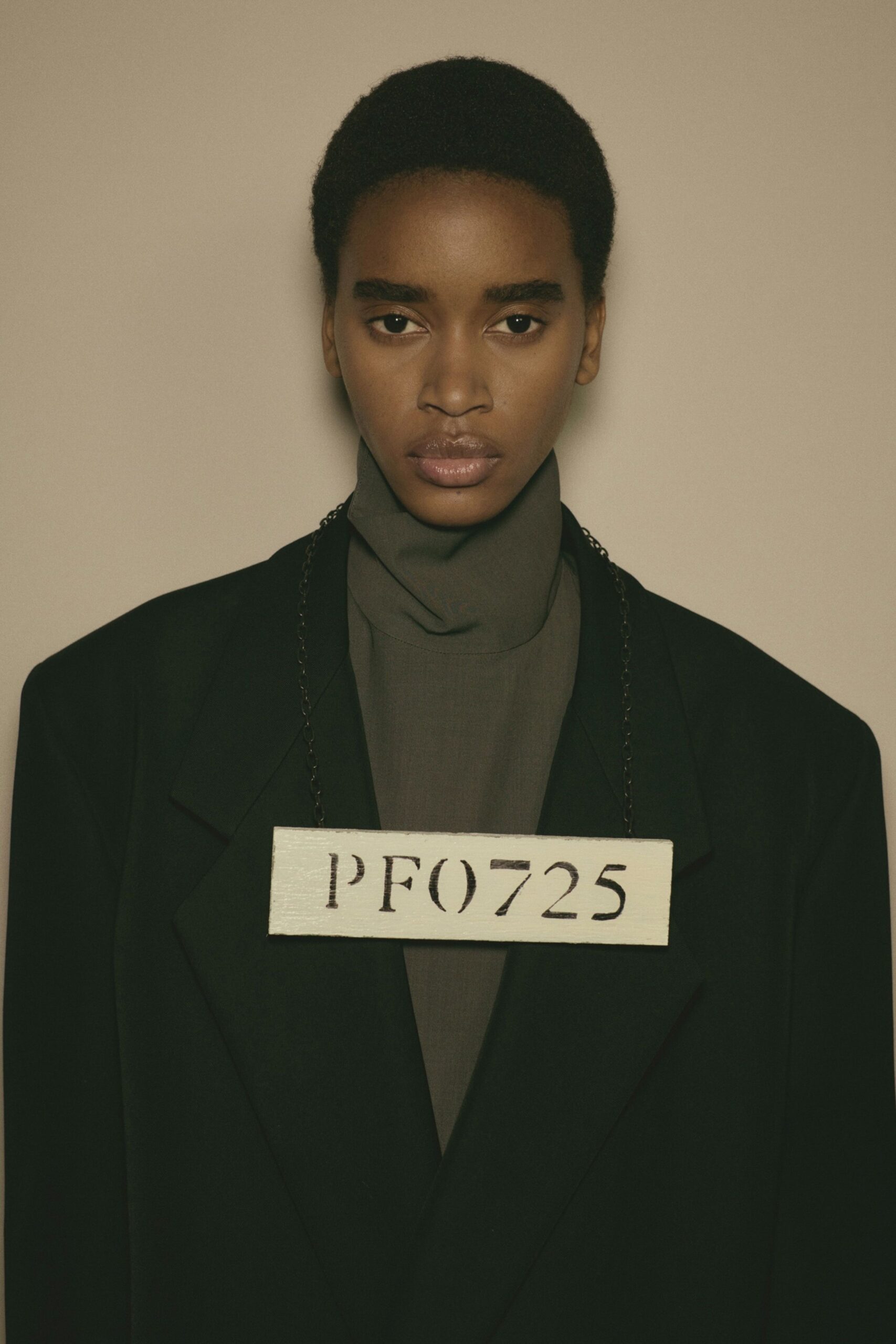 black blazer gray turtleneck