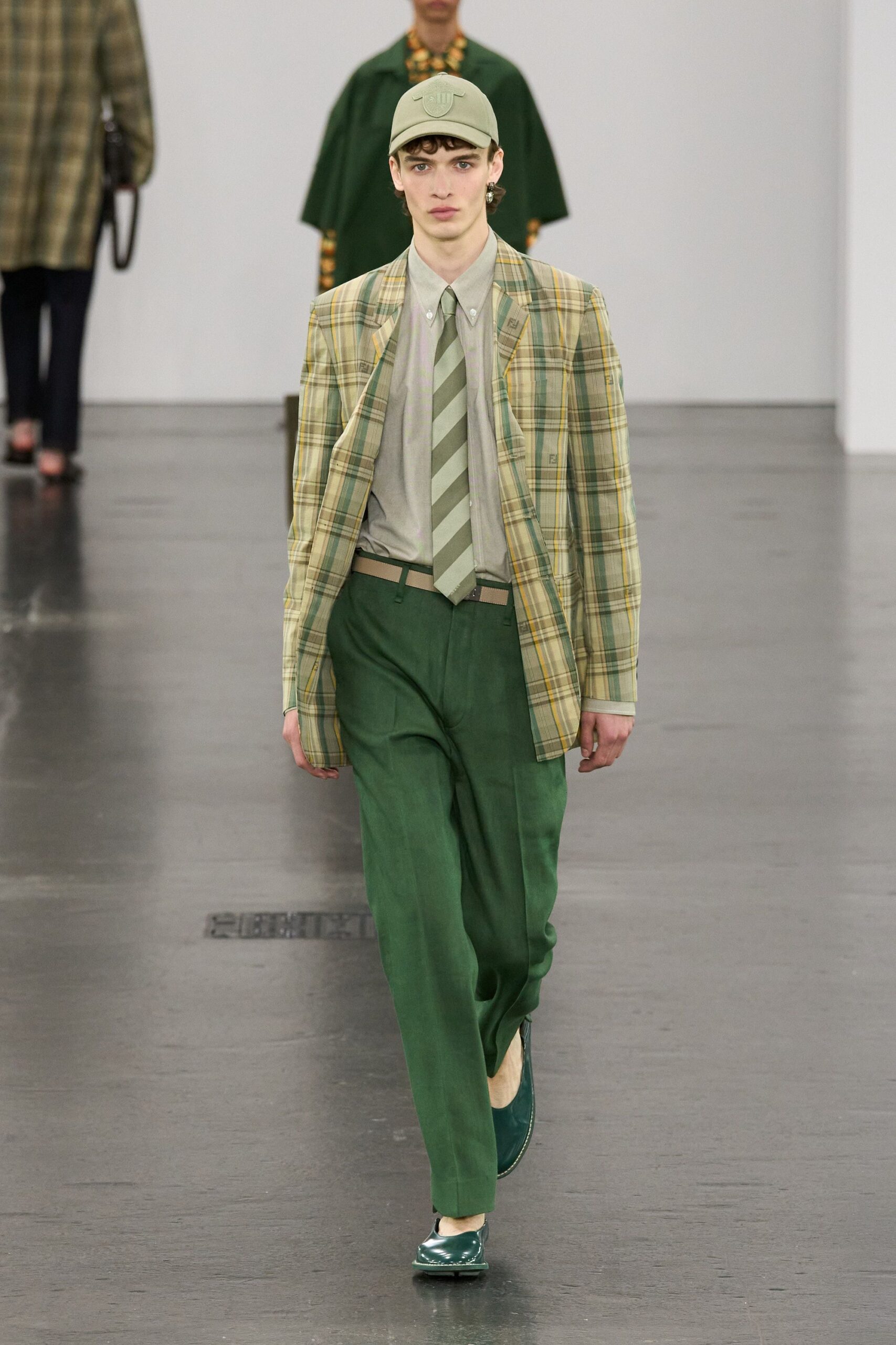 green and beige tailored suit