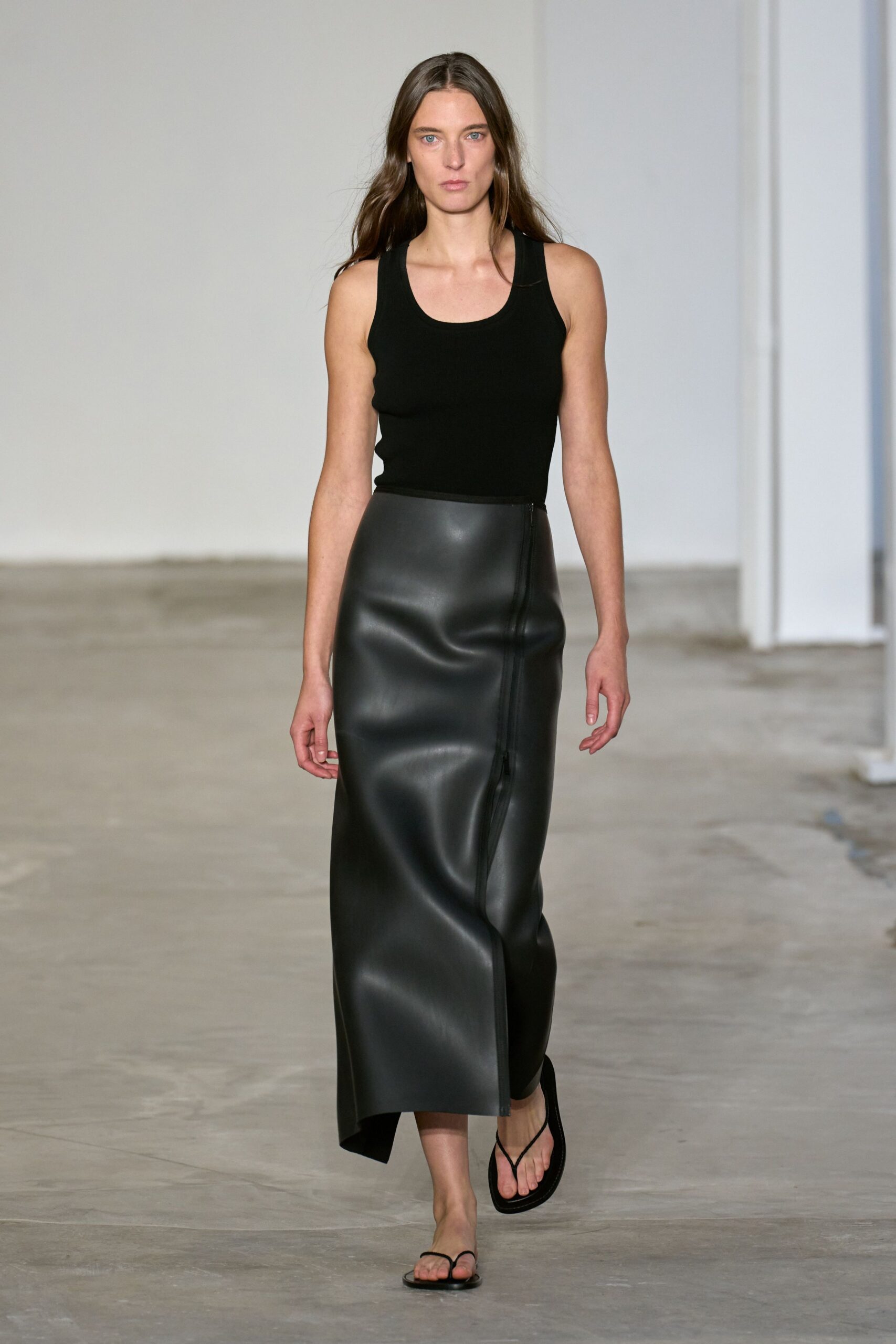 black tank-top and leather skirt