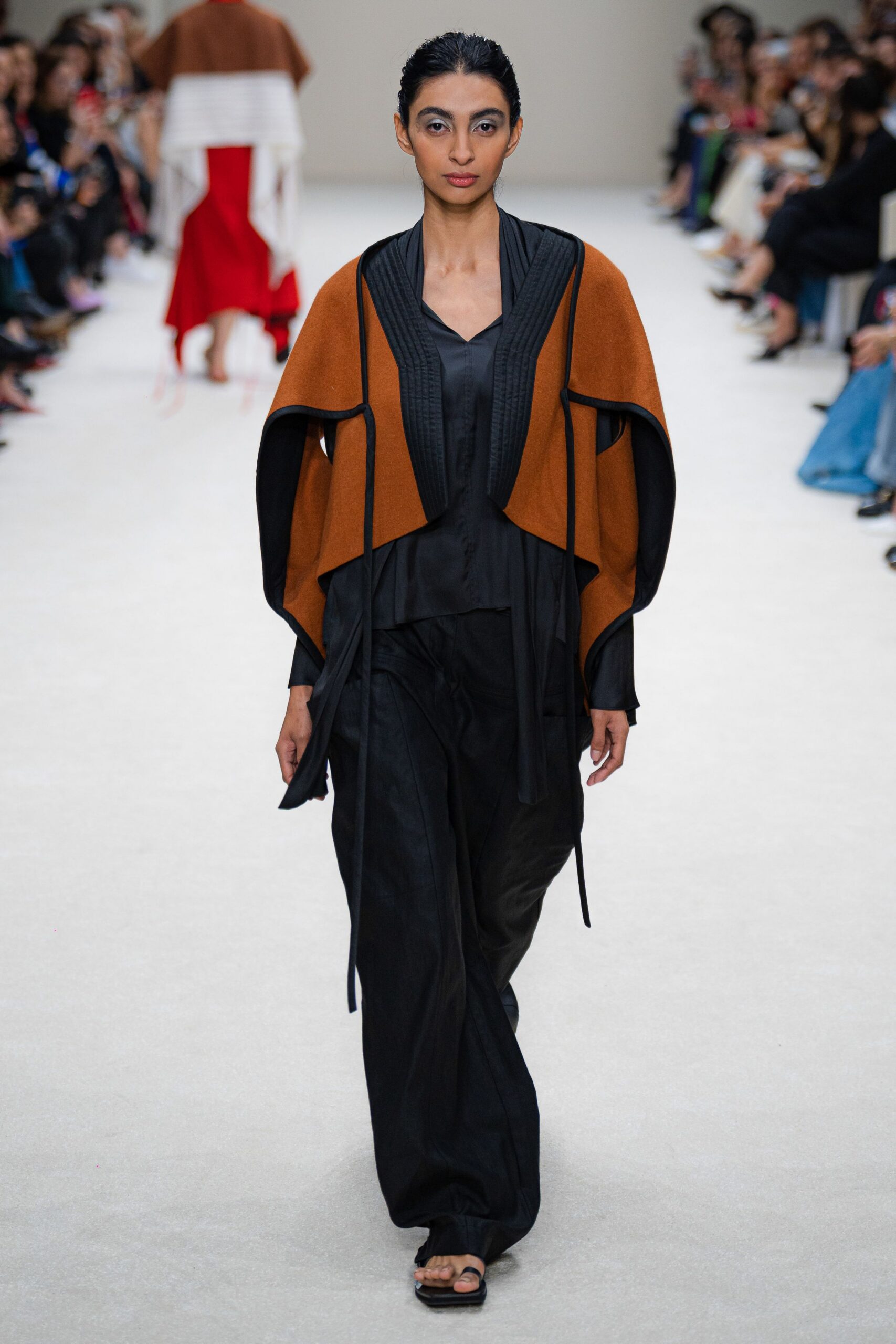 brown layered jacket with black top