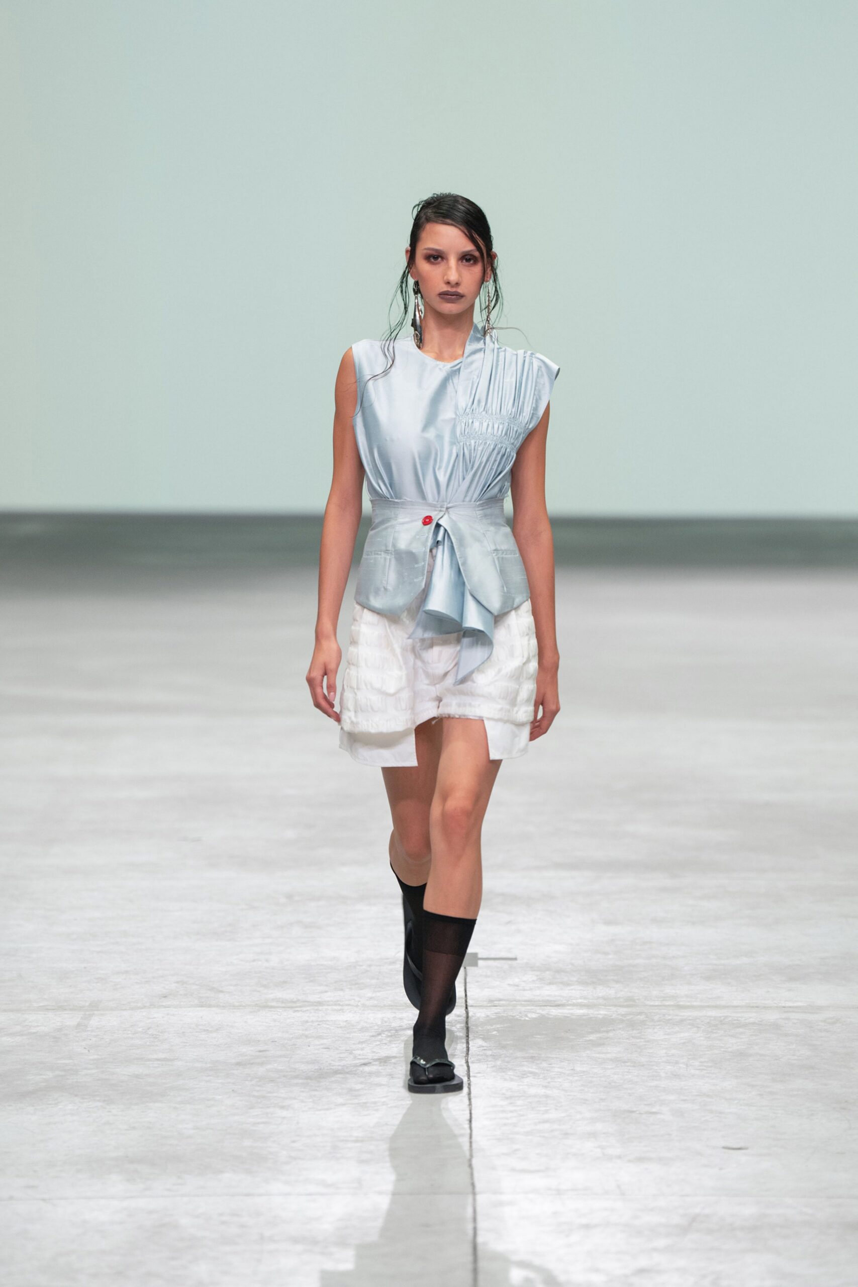 blue silk sleeveless top with white tiered skirt