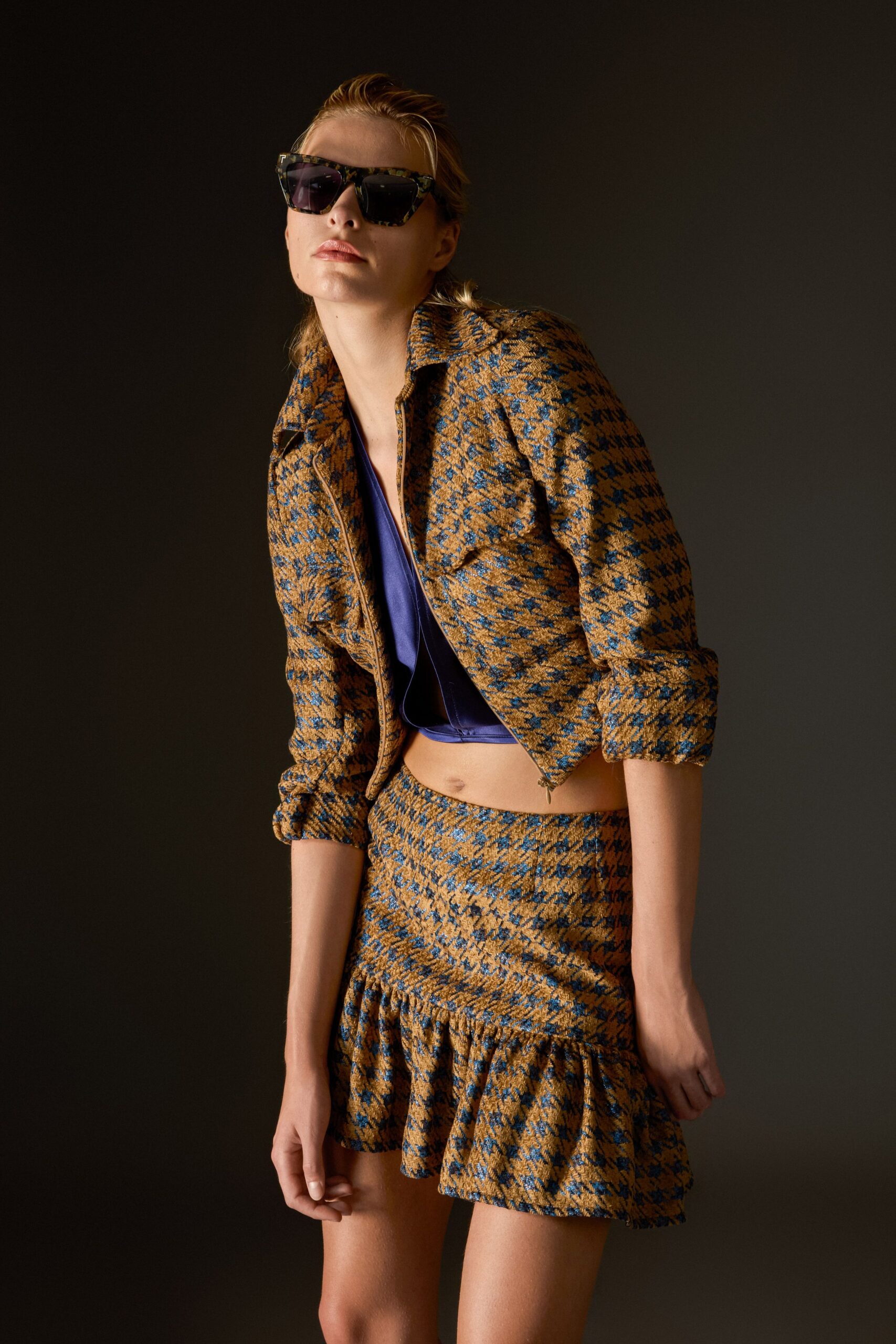 blue tweed jacket with ruffled skirt