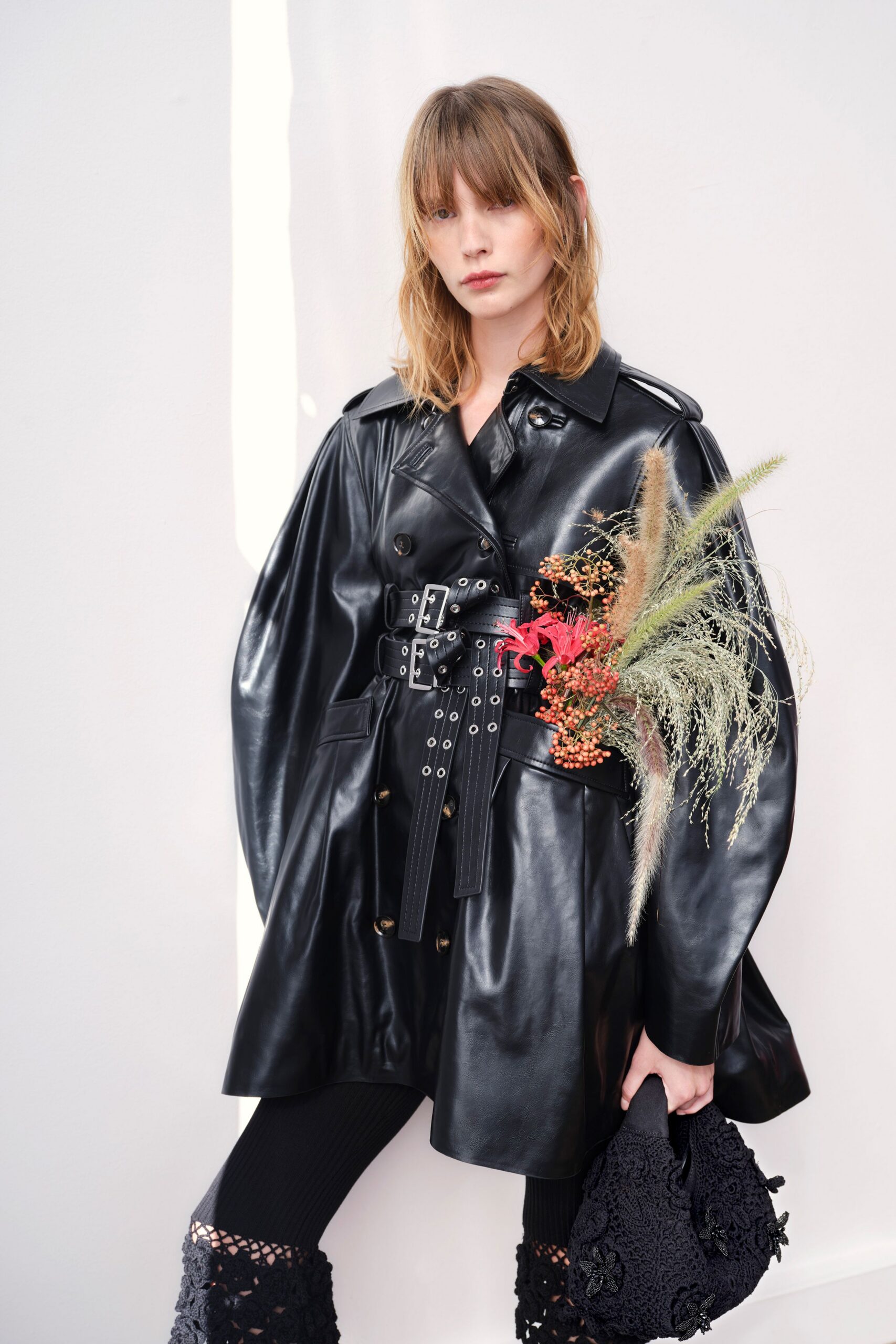 black leather long-sleeve collared oversized belted short coat