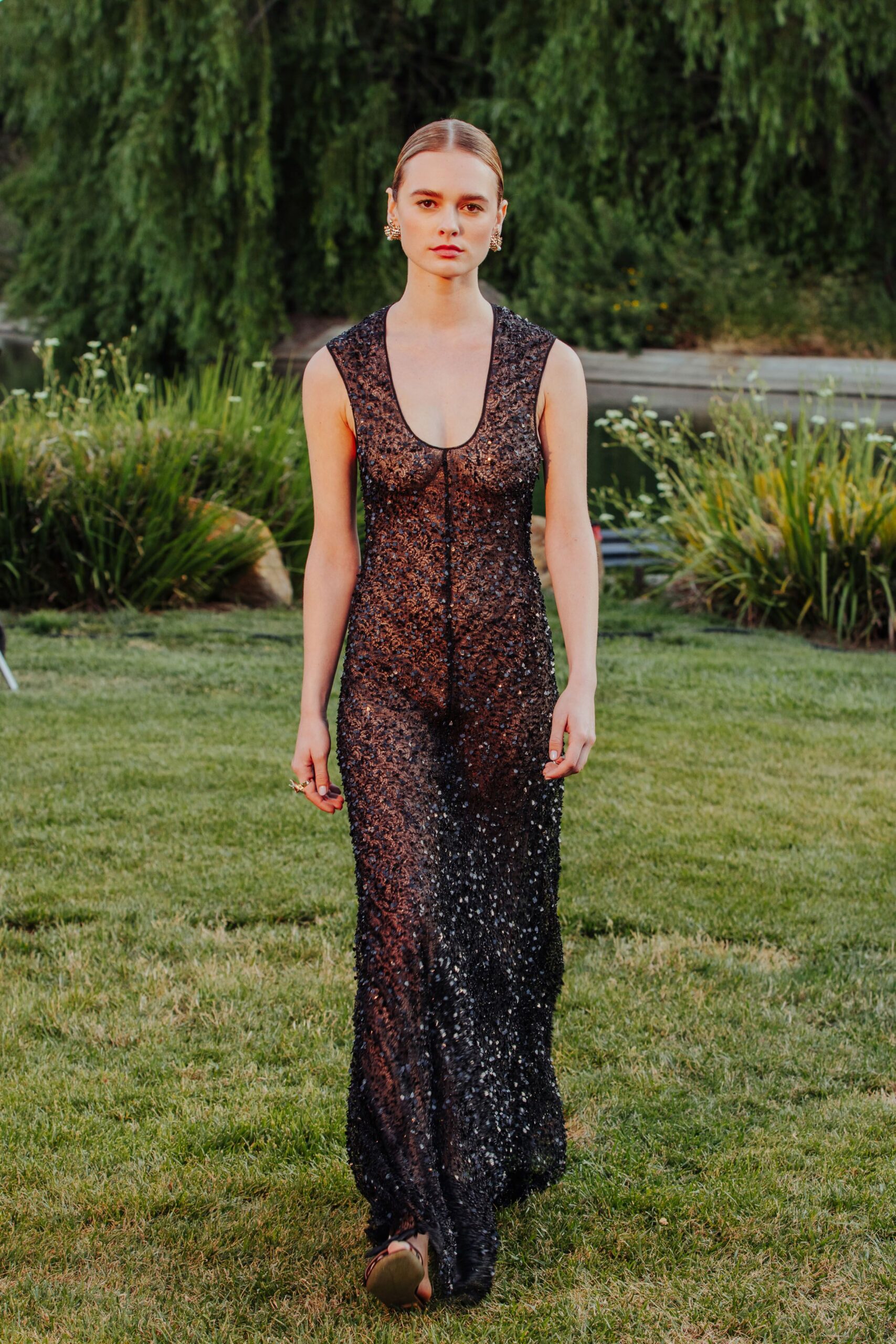 black sequin sleeveless gown