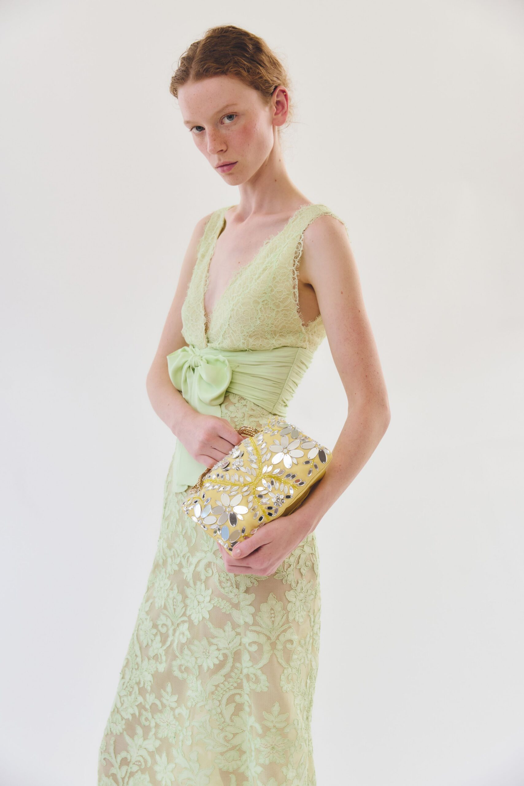 green lace sleeveless v-neck fitted embroidered tiered gown