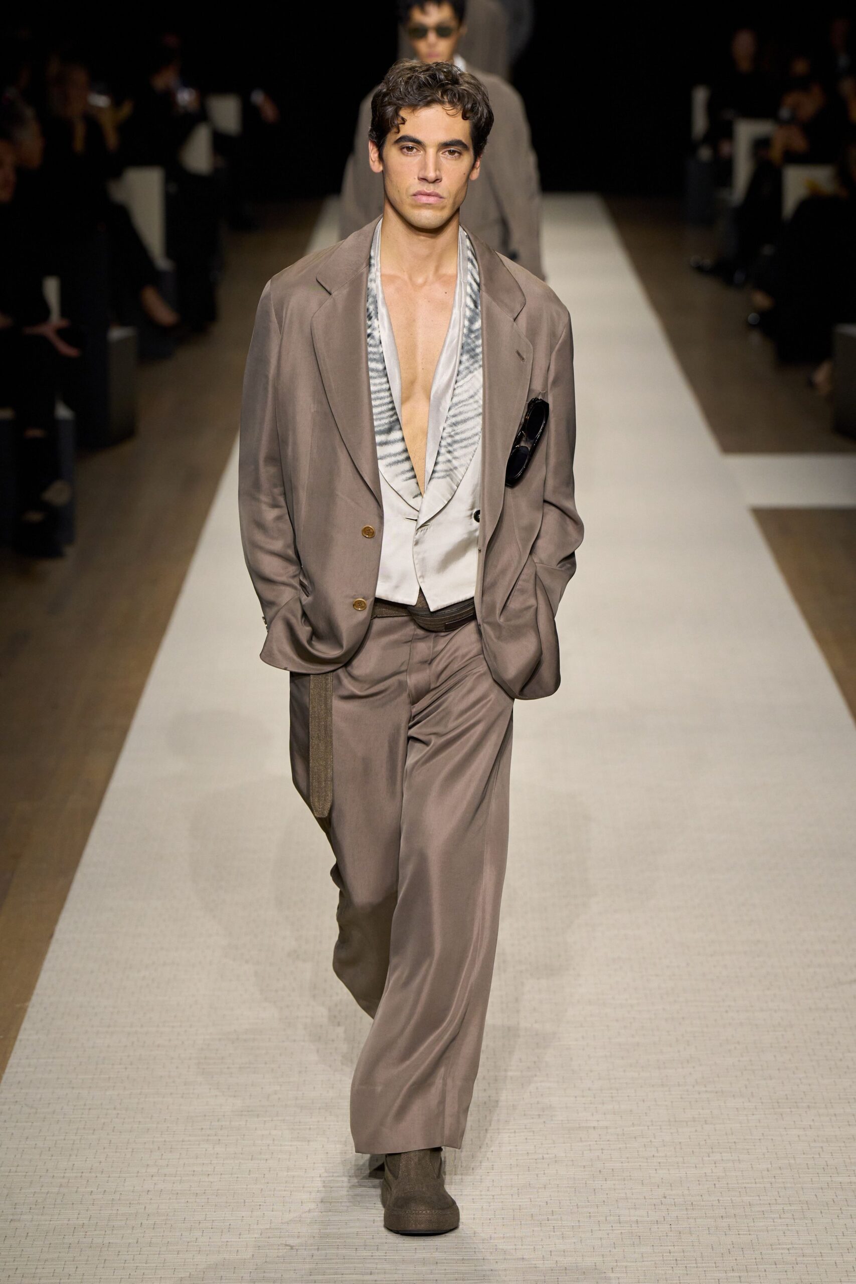 beige relaxed suit with white shirt