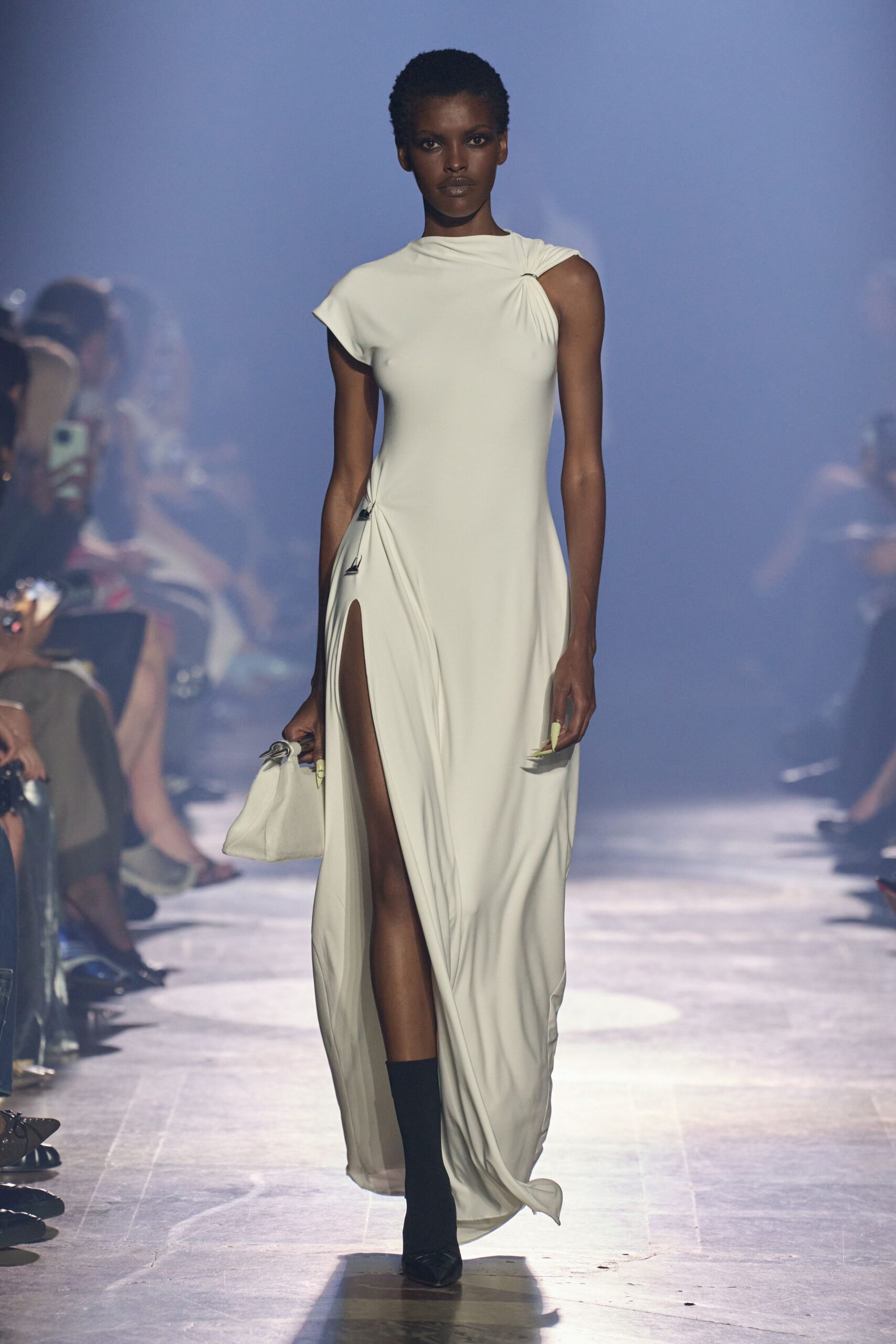 white silk sleeveless high-neck fitted draped flowing gown