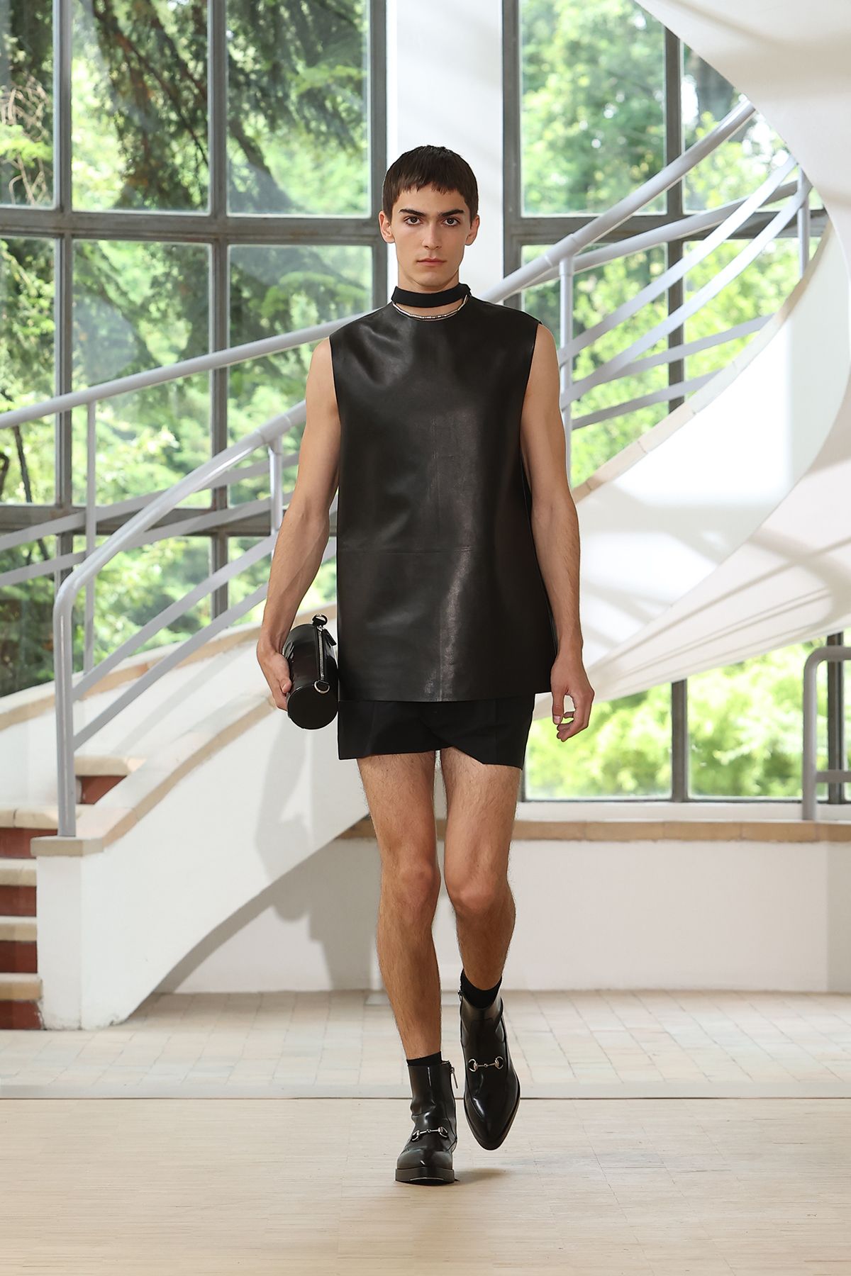black leather sleeveless top and shorts