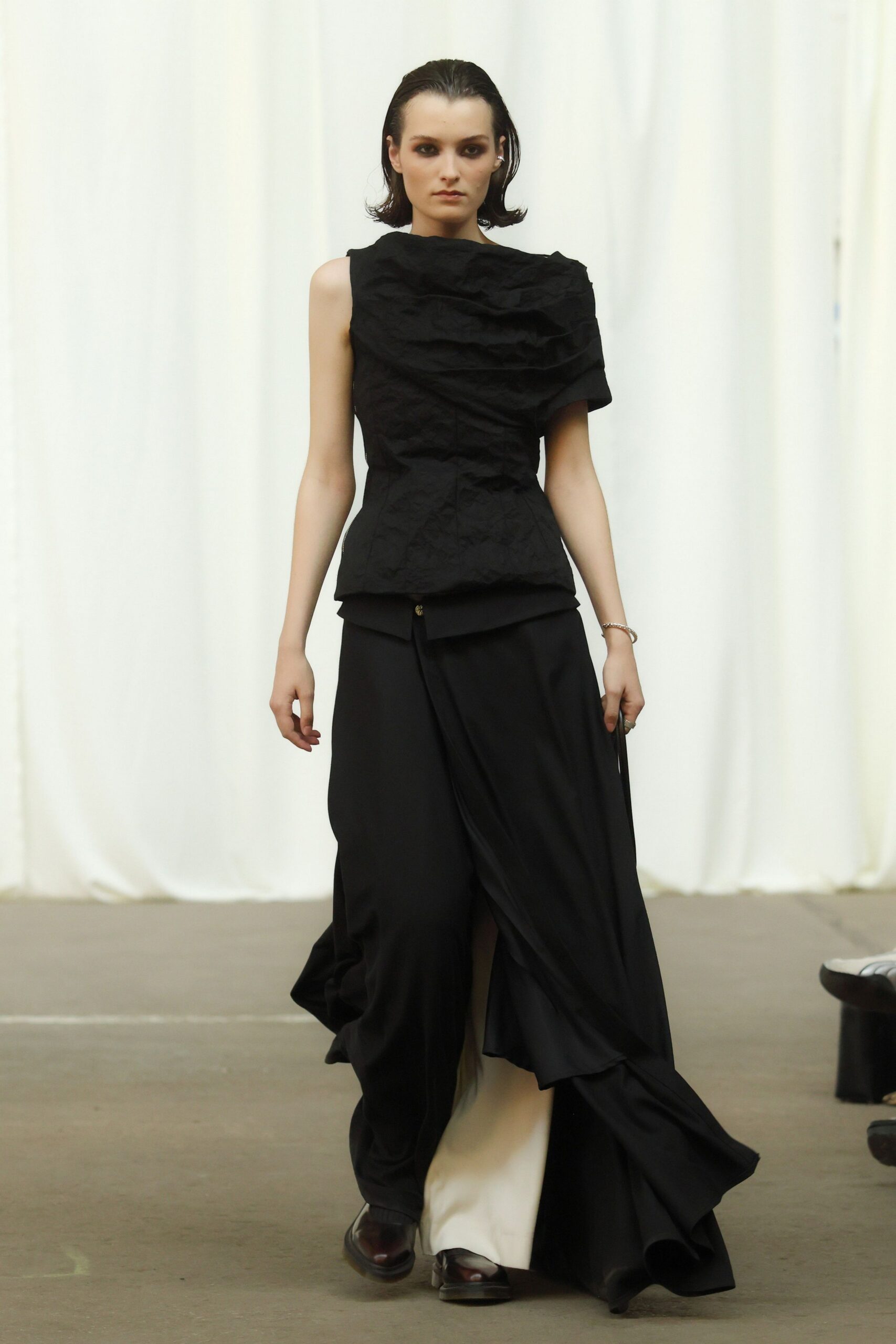 black pleated top and skirt