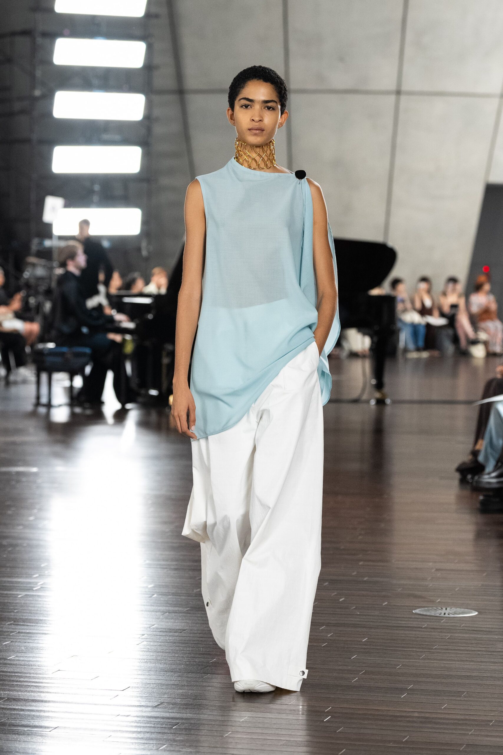 blue relaxed top with white wide-leg pants
