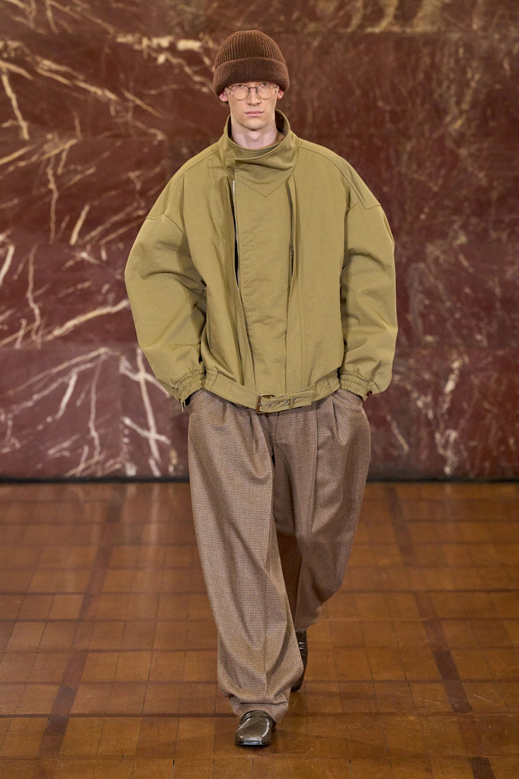 oversized green jacket with relaxed brown pants