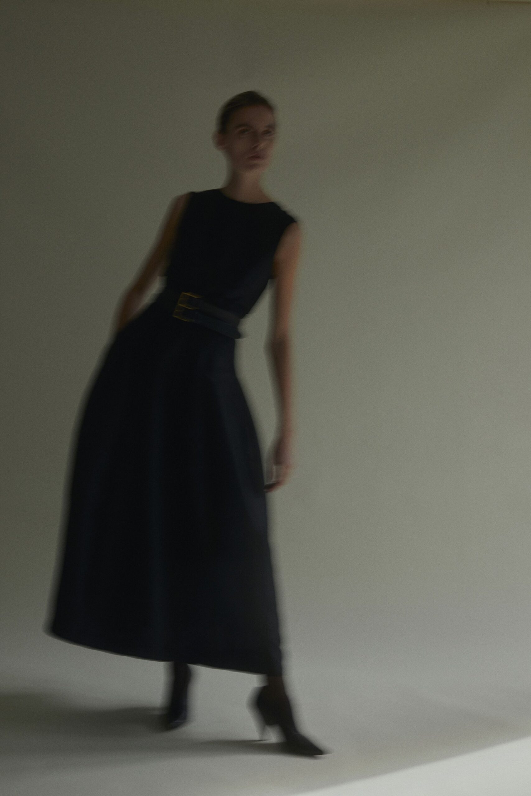 black sleeveless maxi dress with belt