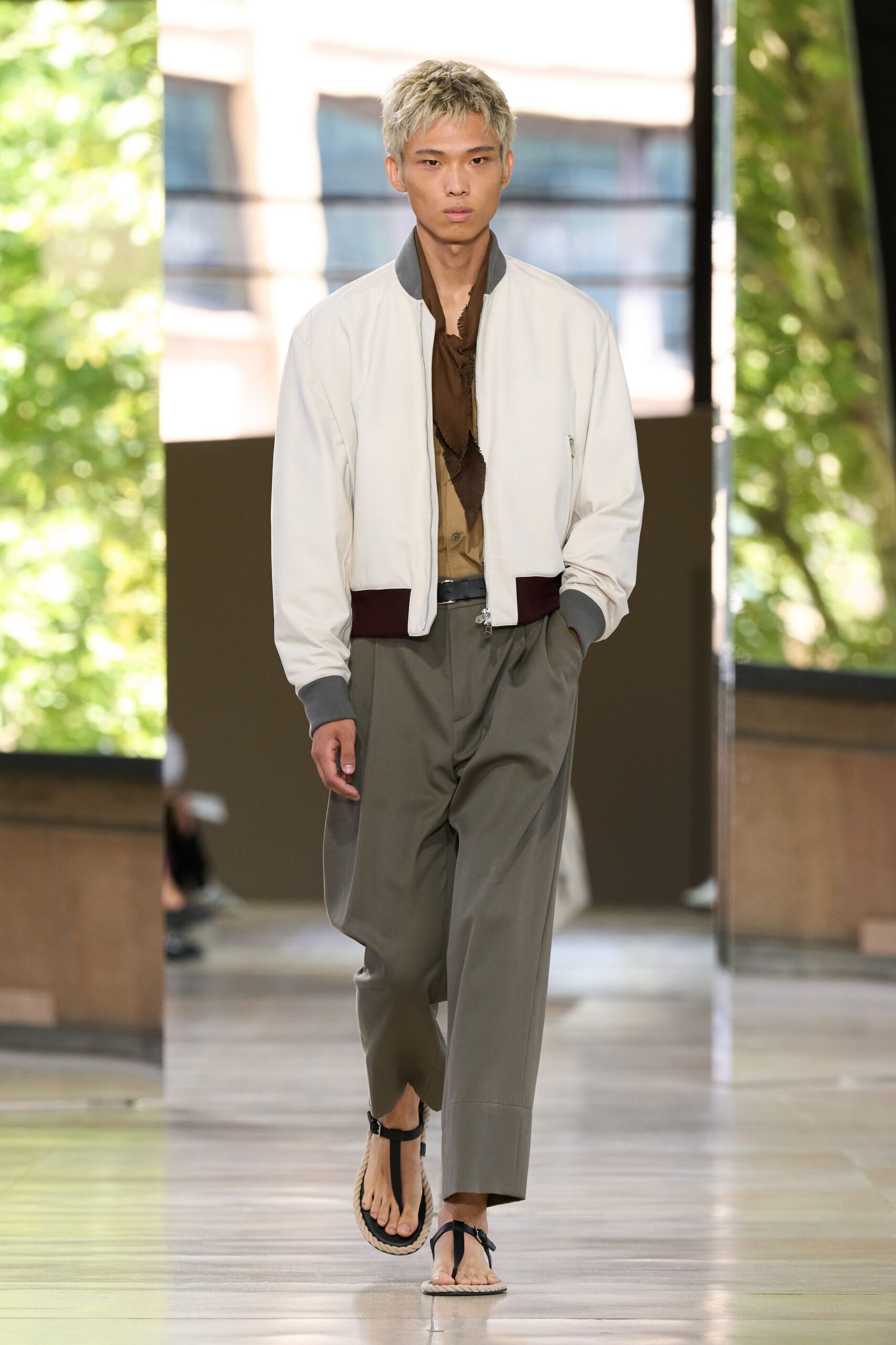 white relaxed jacket with gray pants