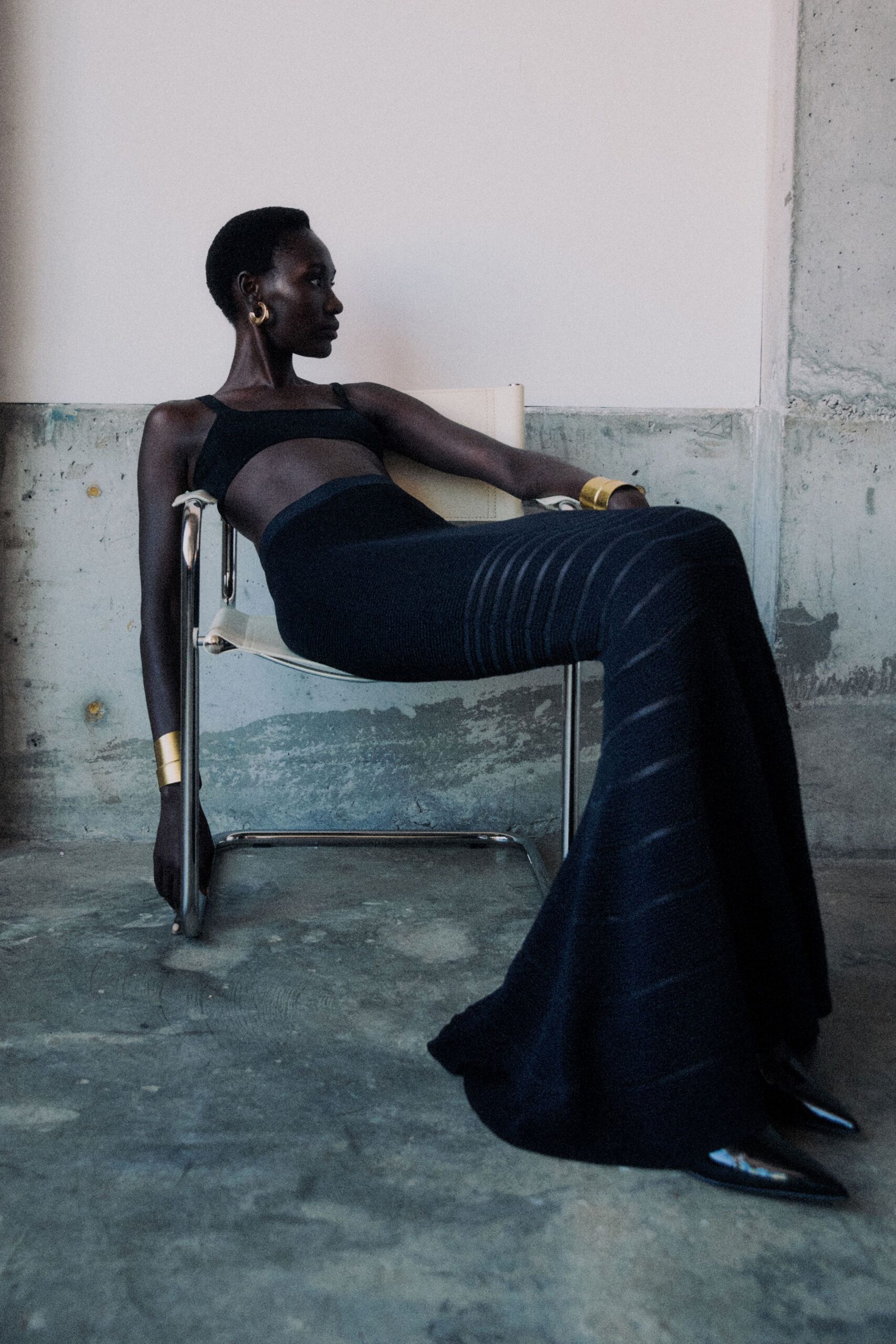 black fitted top and maxi skirt
