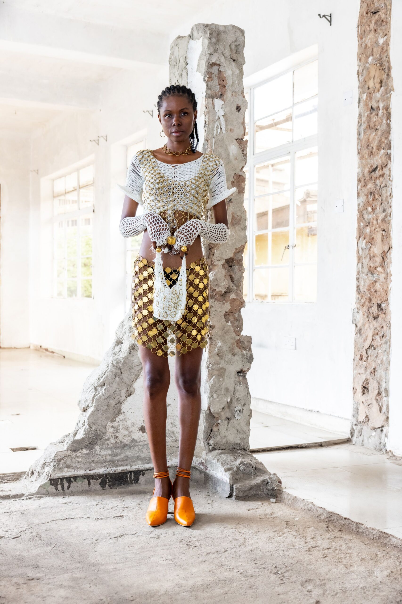 white fitted top gold pleated skirt