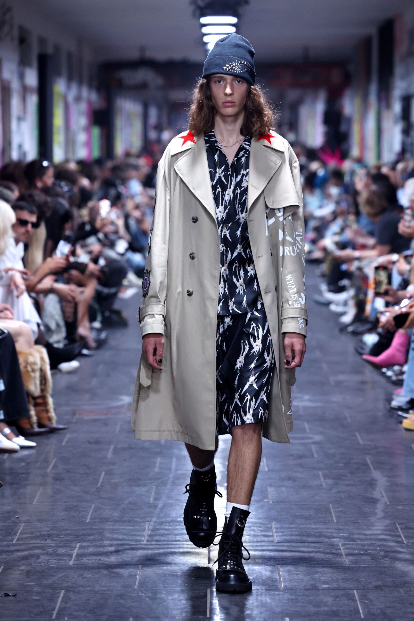 beige trench coat with printed shirt